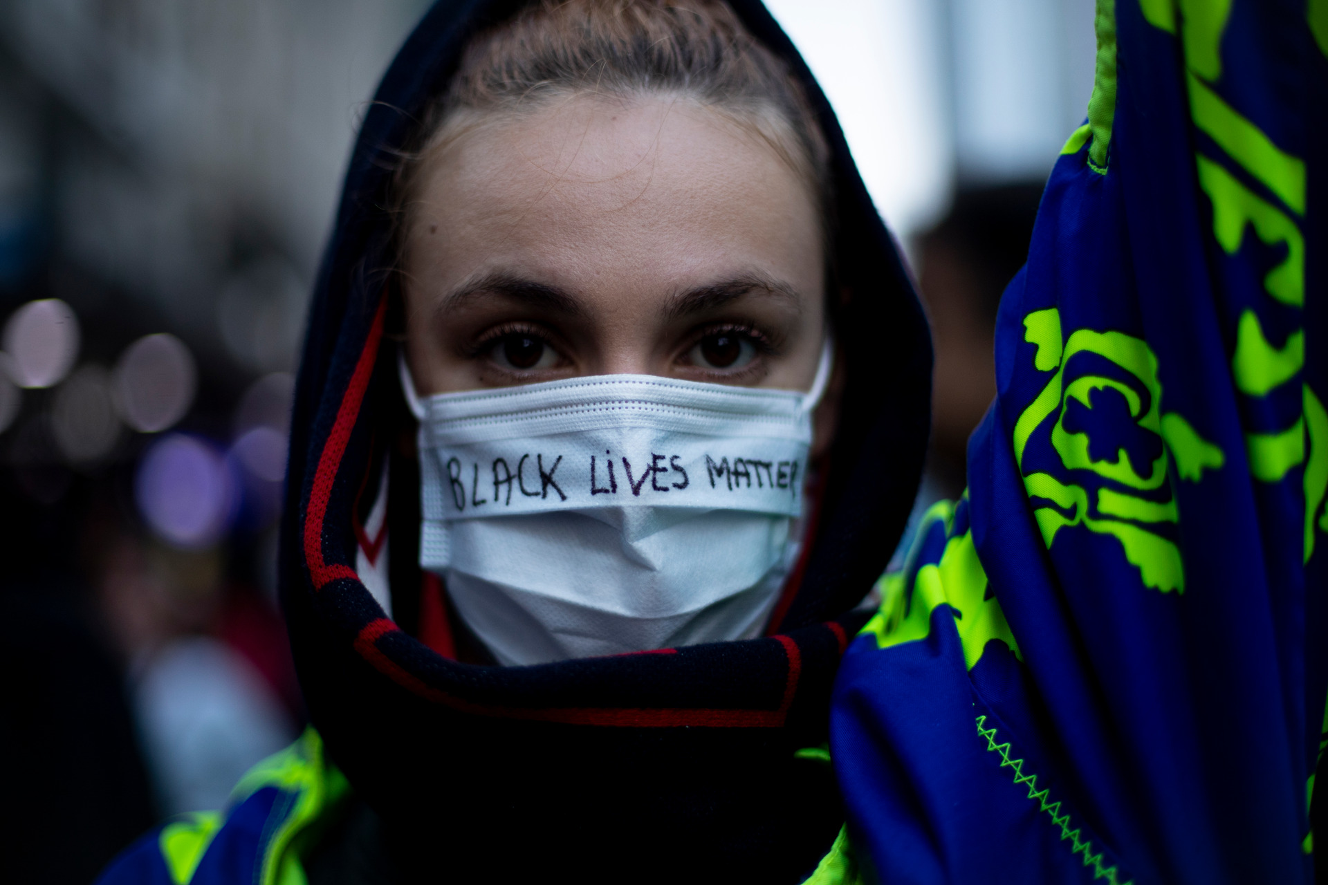 One of the more than 4000 protesters who made their way down Queen St towards the United States Consulate on Monday. Photo / Dean Purcell
