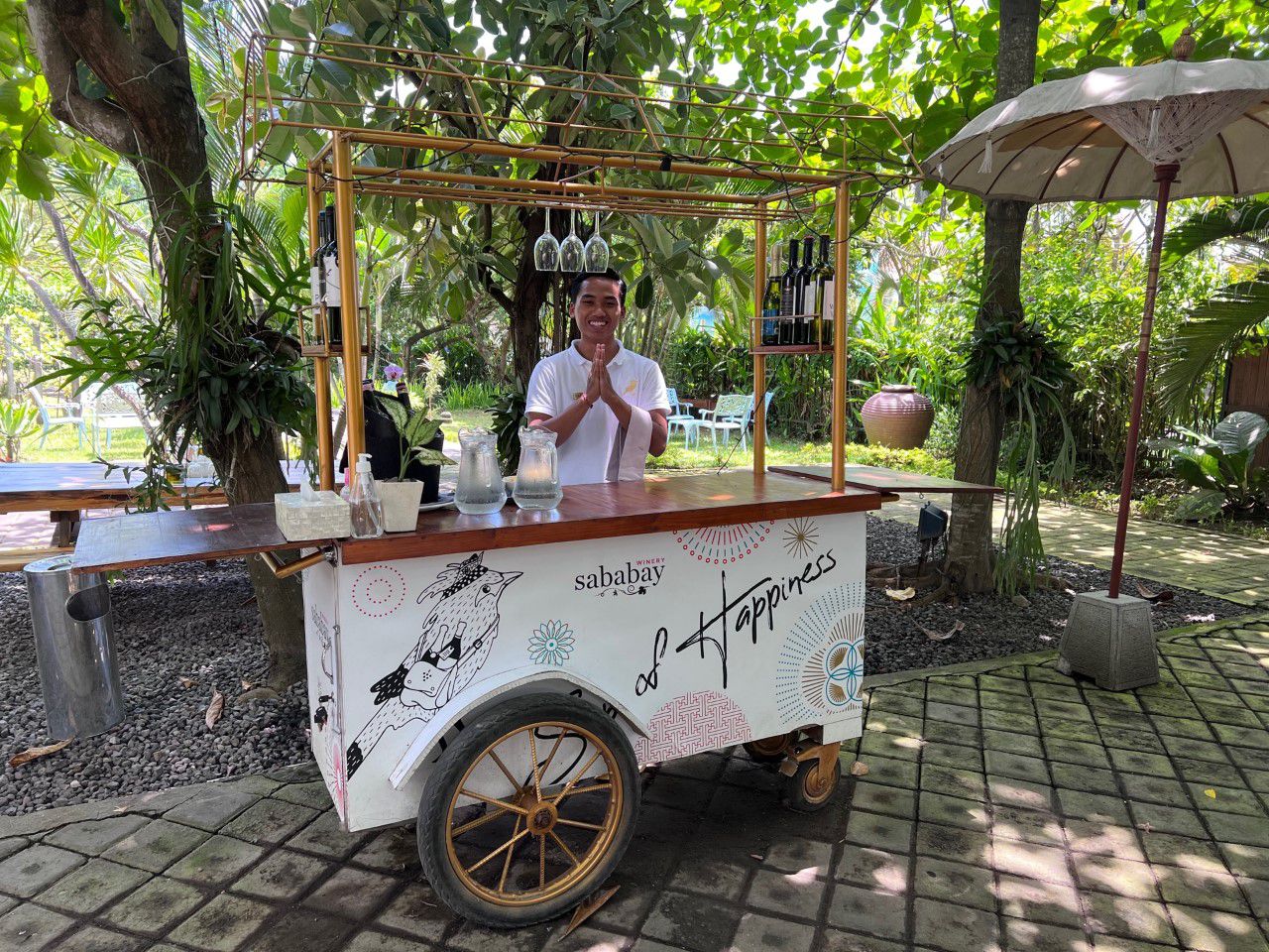 Wine is celebrated and plentiful under the shady trees at Bali's Saba Bay Winery. Photo / Kiri Gillespie