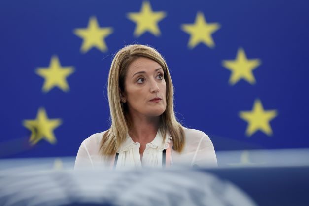 European Parliament President Roberta Metsola delivers her speech during a special session on lobbying this week in Strasbourg, eastern France. Four people have been charged with being part of a criminal group, money laundering and corruption in connection with an investigation into suspected influence peddling by a Persian Gulf country at the European Union's parliament. Photo / AP