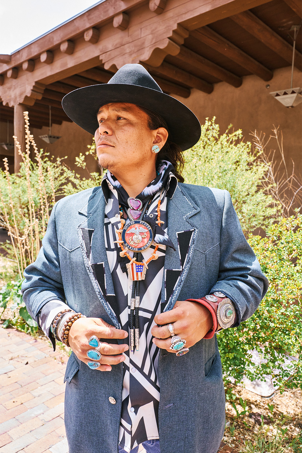 Tyler Tarbon Lansing, a Diné sporting both Native and American-patriotic accessories during Native Fashion Week. Photo / Simbarashe Cha for The New York Times