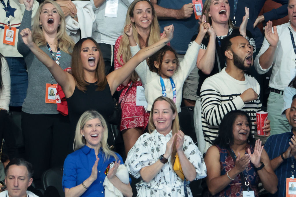 Chrissy Teigen and John Legend celebrate the gold medal of the US 4x100m freestyle relay during day one of the swimming event in Nanterre near Paris, France. Photo / Getty Images