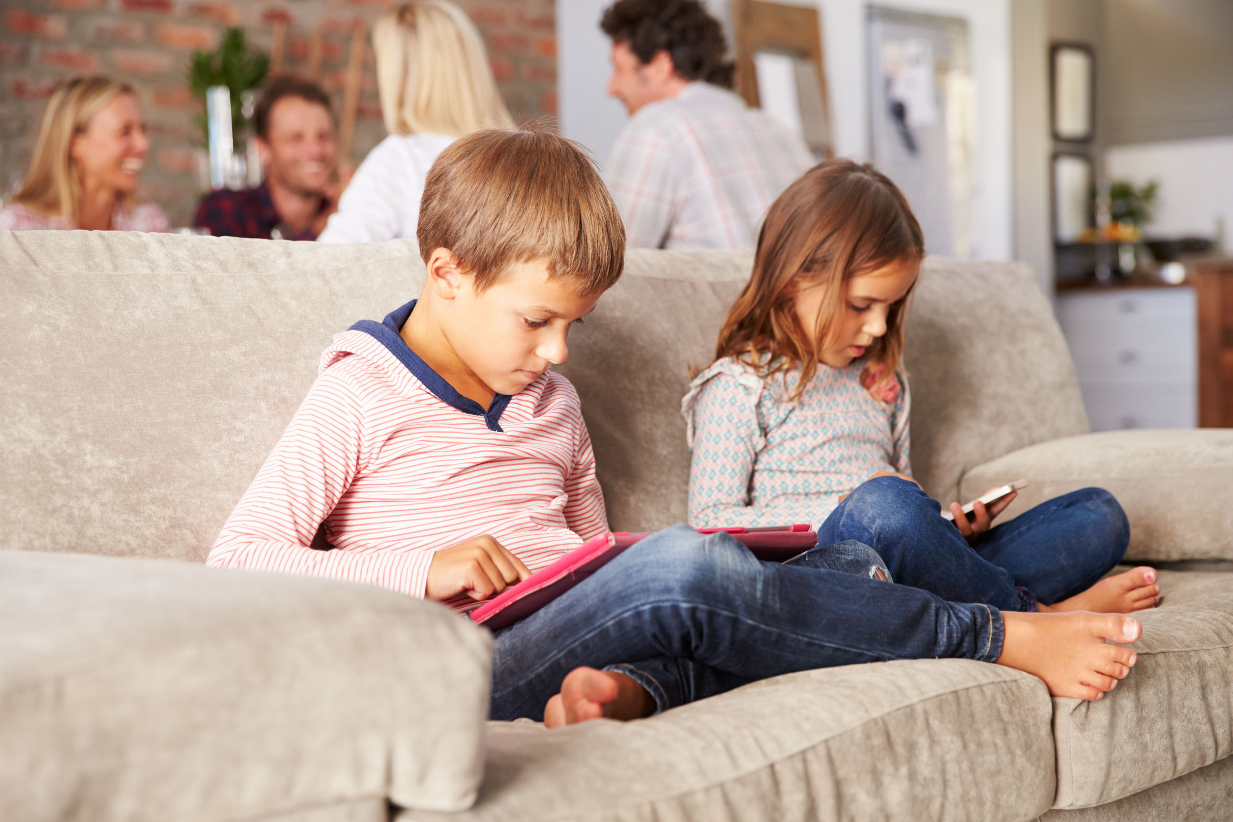Children using smartphones and tablets from an early age can have both troubling and positive consequences, a leading academic says. Photo / 123RF