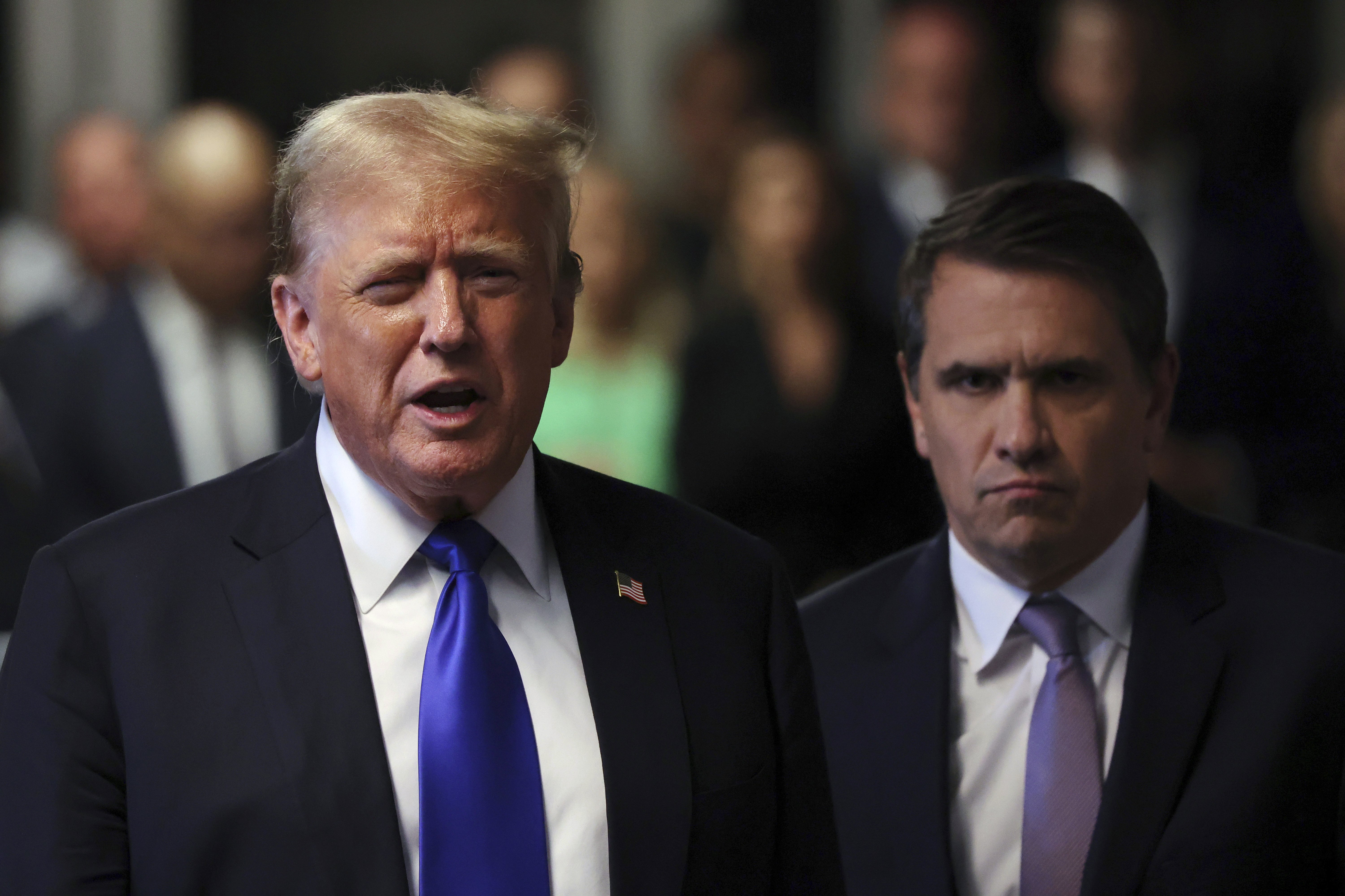 Former US President Donald Trump speaks to the media alongside his attorney Todd Blanche after the conclusion of his hush money trial. Photo / AP