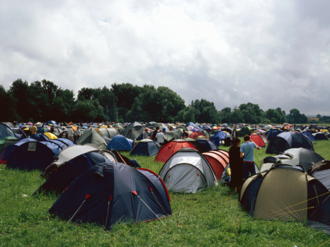 A camping field full of tents. Could this be an option for your holiday?