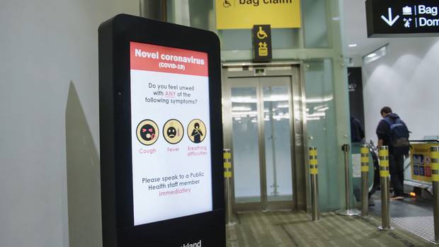 Advice at Auckland International Airport for people arriving home from overseas. Photo / Supplied