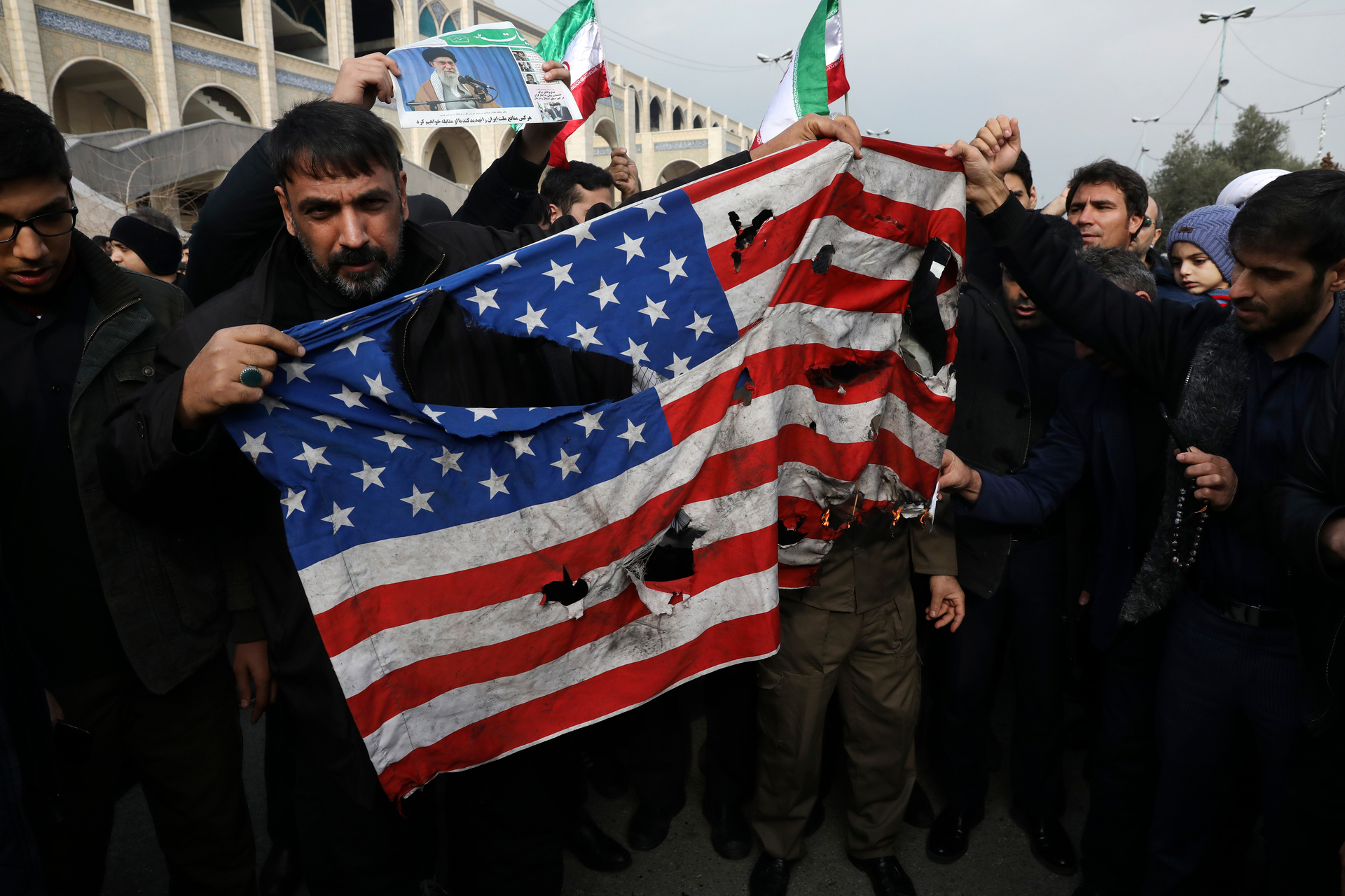 Protesters burn a US flag during a demonstration over the airstrike in Iraq that killed Iranian Revolutionary Guard Gen. Qassem Soleimani, in Tehran on January 3. Photo / AP