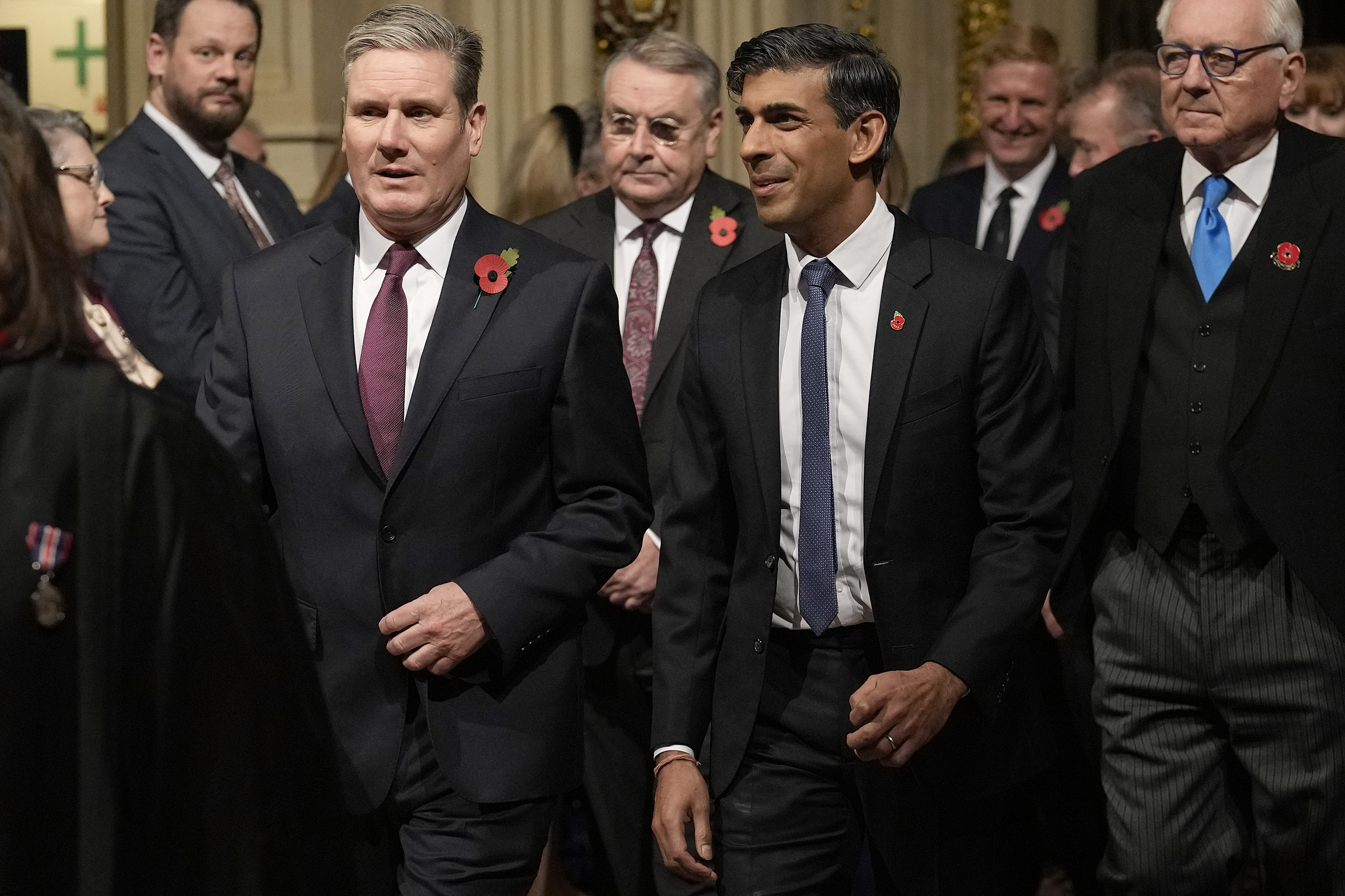 Britain's Prime Minister Rishi Sunak (right) and Labour Party leader Keir Starmer pass through the Peer's Lobby to attend the State Opening of Parliament at the Palace of Westminster in London on Tuesday, November 7, 2023.  Photo / AP