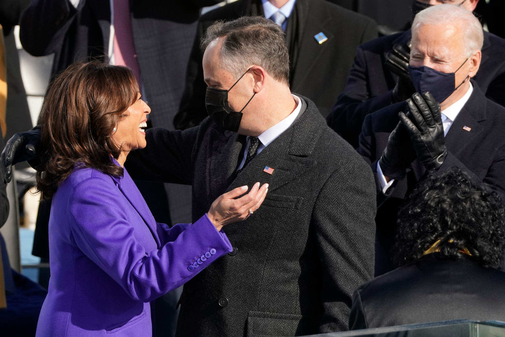 Vice President Kamala Harris hugs her husband Doug Emhoff after being sworn in as vice president. Photo / AP