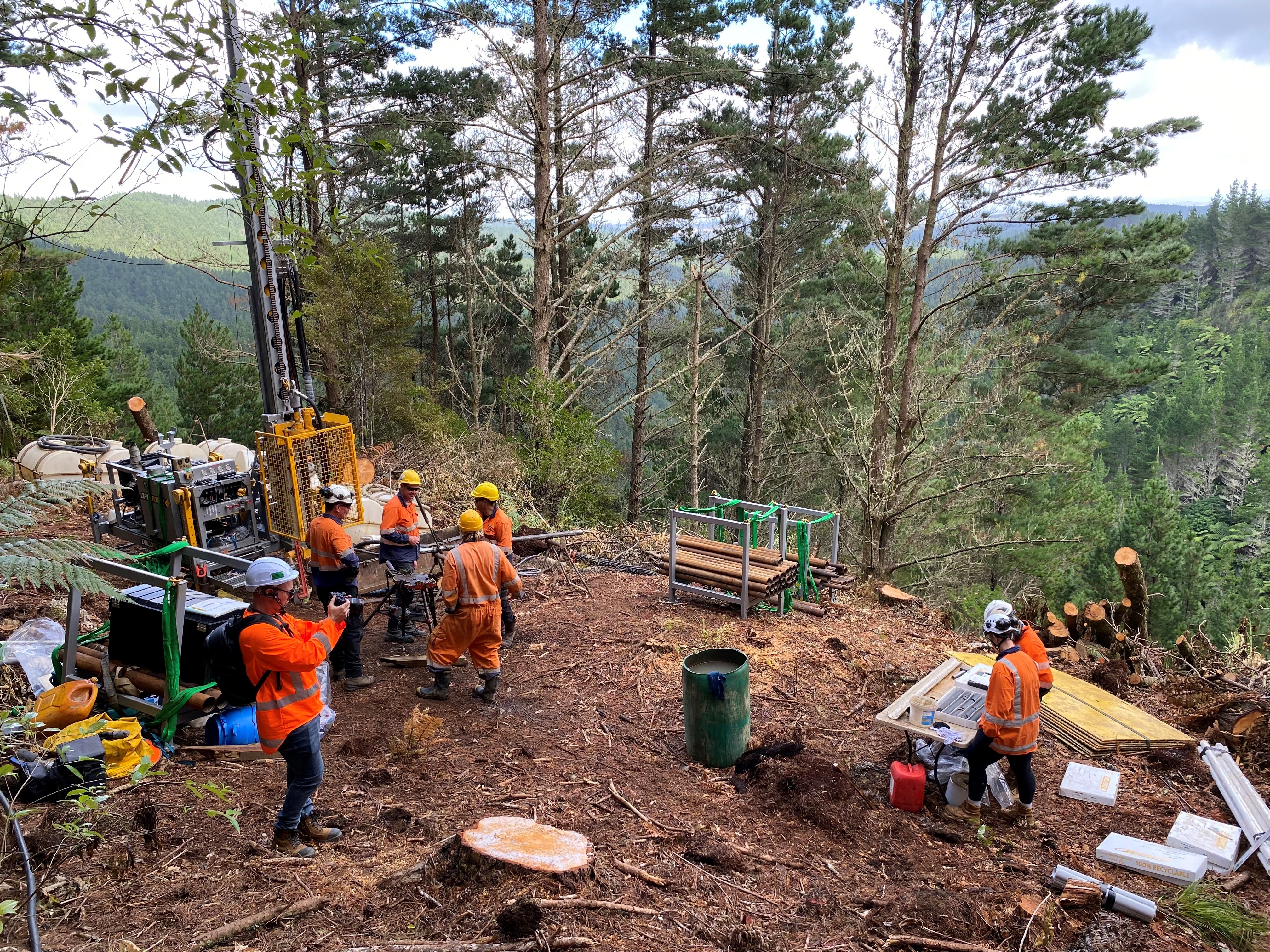 The geotechnical team on location in the Dome Valley. The Warkworth to Te Hana alignment will run through the valley in the background.