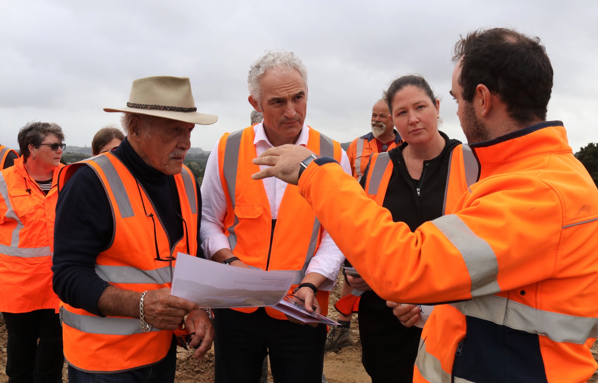 Dam engineer Eli Maynard discusses the project with, from left, Te Tai Tokerau Water trustee Dover Samuels, Regional Economic Development Minister Stuart Nash and Northland MP Willow-Jean Prime. Photo / Peter de Graaf