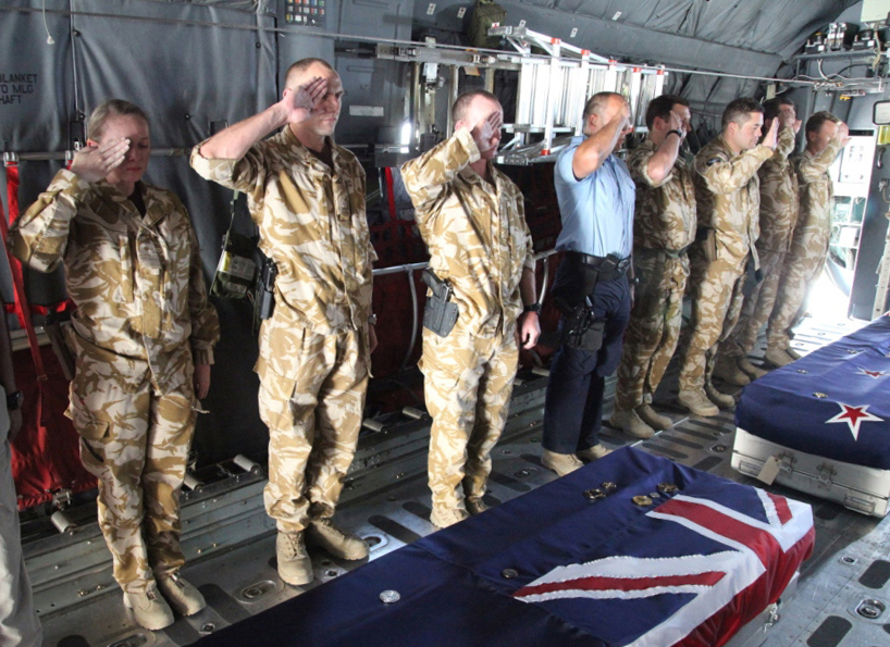 Kiwis pay their respects during the ramp ceremony for LCPL Pralli Durrer and LCPL Rory Malone at Bagram Air Force Base. Photo / Supplied