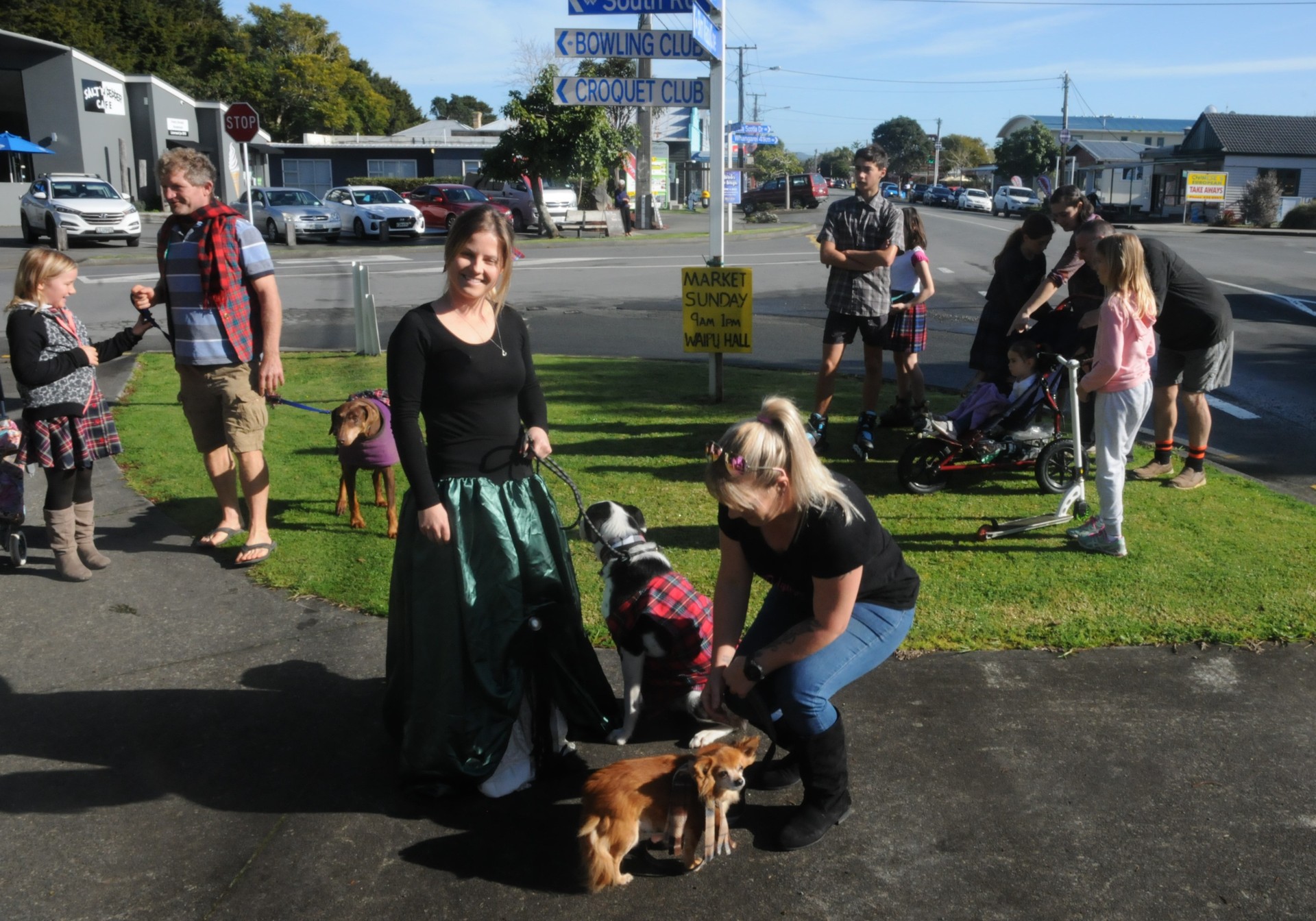 Kylie and Natalie Parsons with Max the collie cross and Basil the chihuahua at the Waipū pet parade. Photo / Dan Sloane