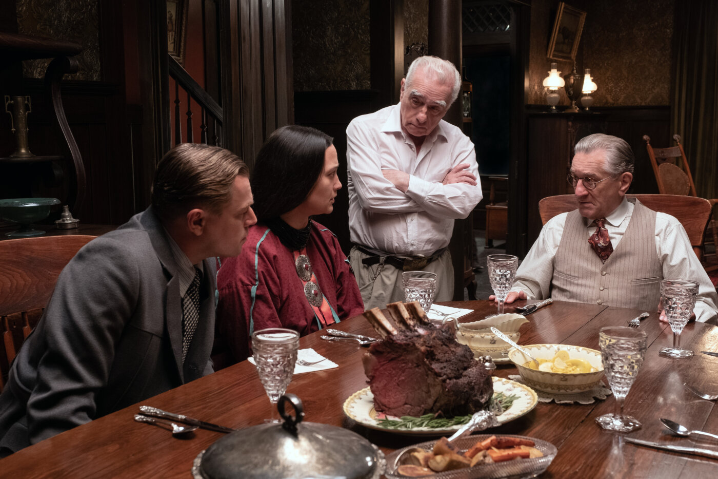 Martin Scorsese with Leonardo DiCaprio, Lily Gladstone and Robert De Niro on the set of The Killers of the Flower Moon.