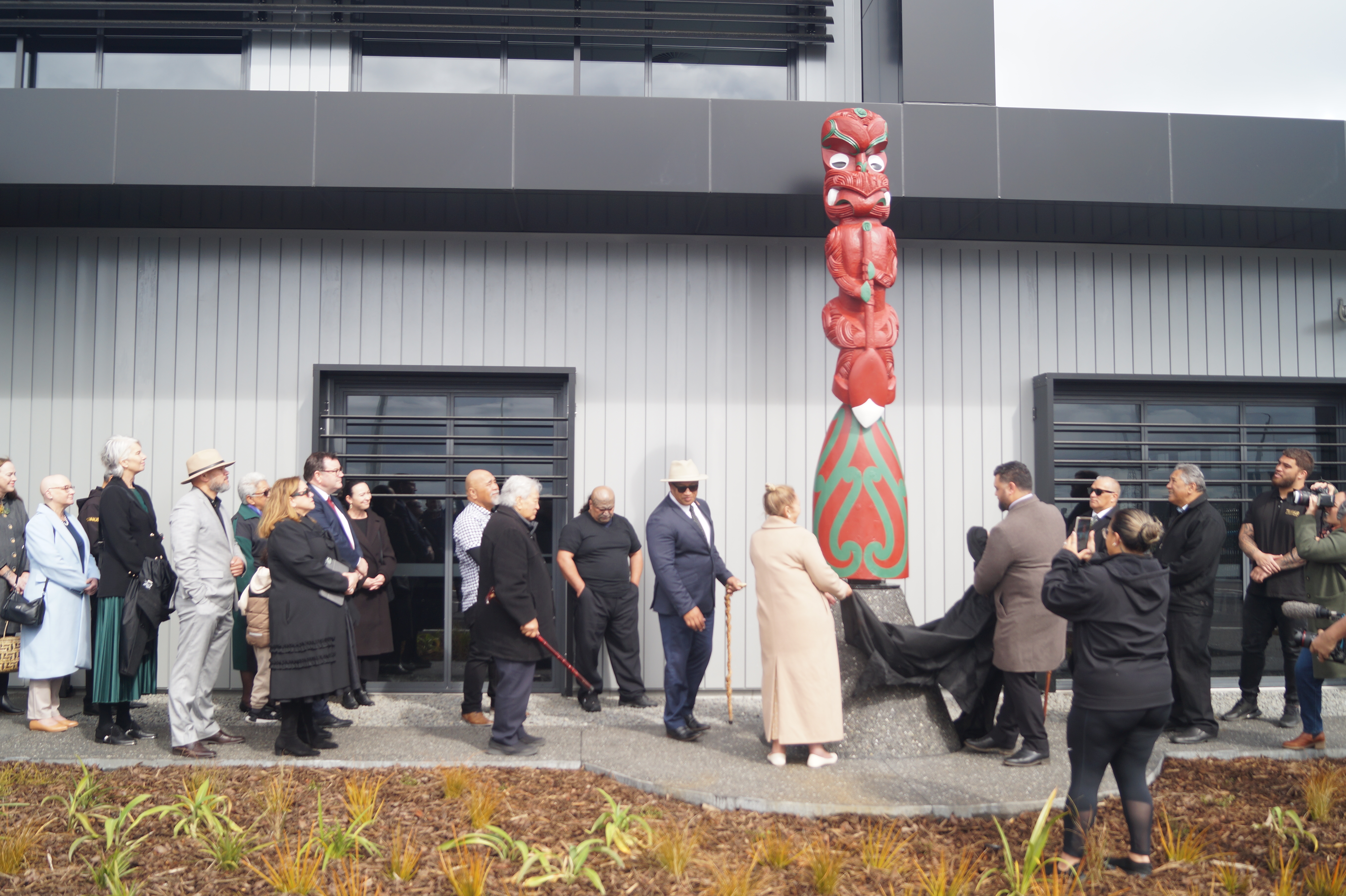 Mana whenua unveiled a pou, located in front of the Kmart Distribution Centre. Photo / Danielle Zollickhofer