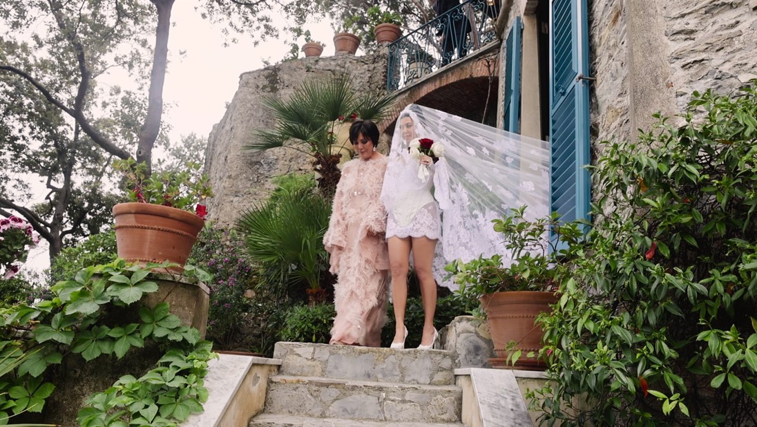 Kris Jenner walked her daughter, Kourtney Kardashian down the aisle. Photo /Disney +