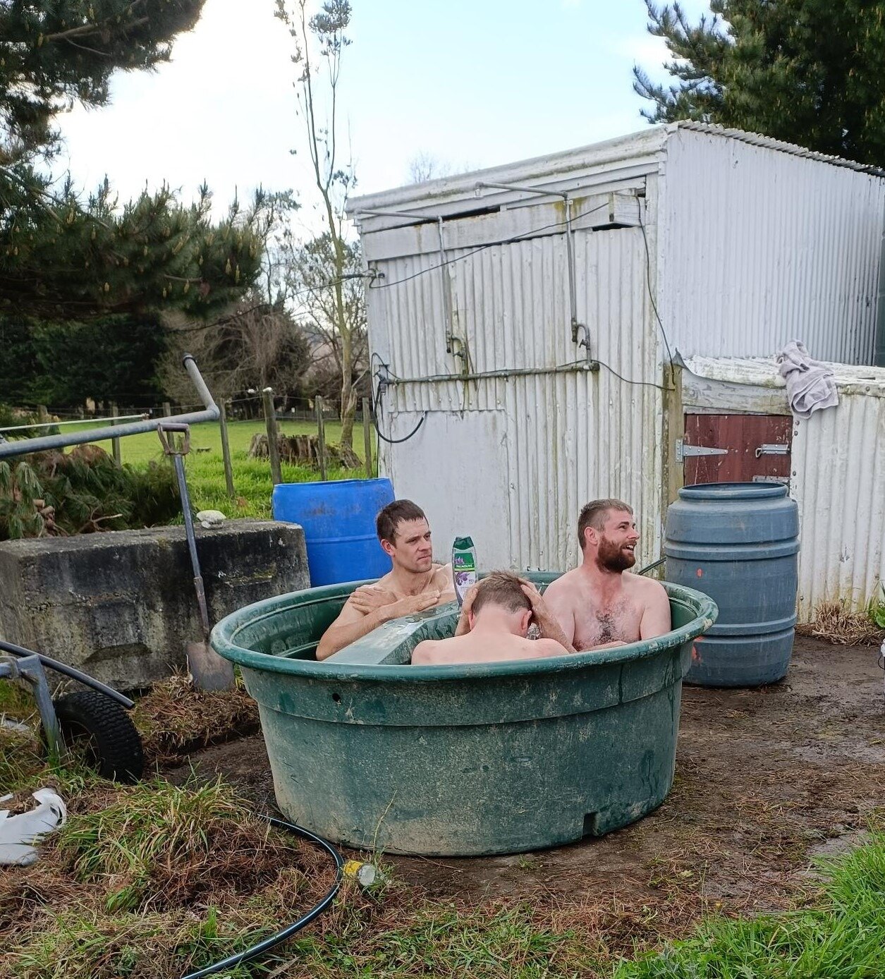 Puketoi men post-game in one of the many water troughs brought in by Kerry Fergus and Michael Burmeister including hot water from their respective farms to allow the ‘baths’ to be used which is what the Toki boys used back in the very early days before showers were installed.