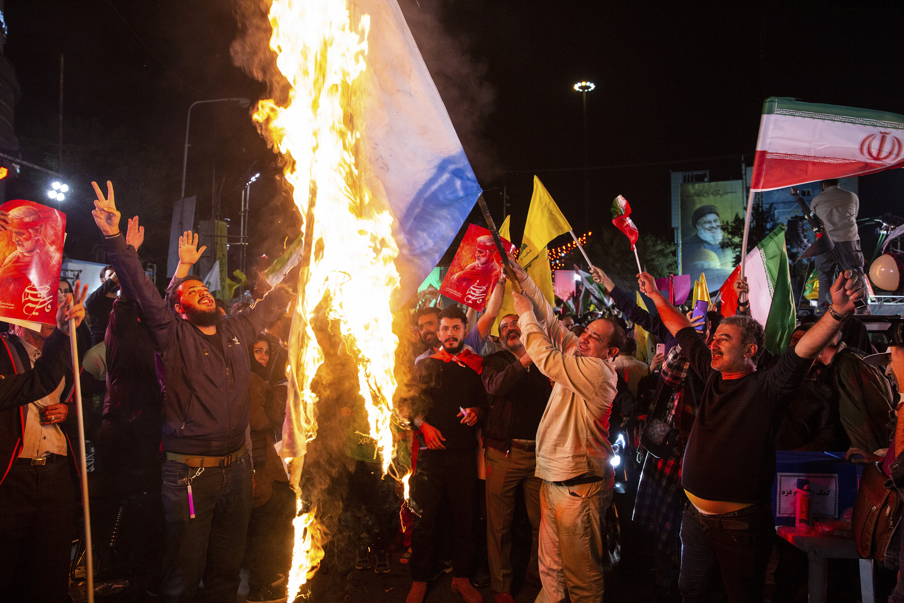 Iranians in Tehran cheering the strike on Israel. Photo / Arash Khamooshi, The New York Times