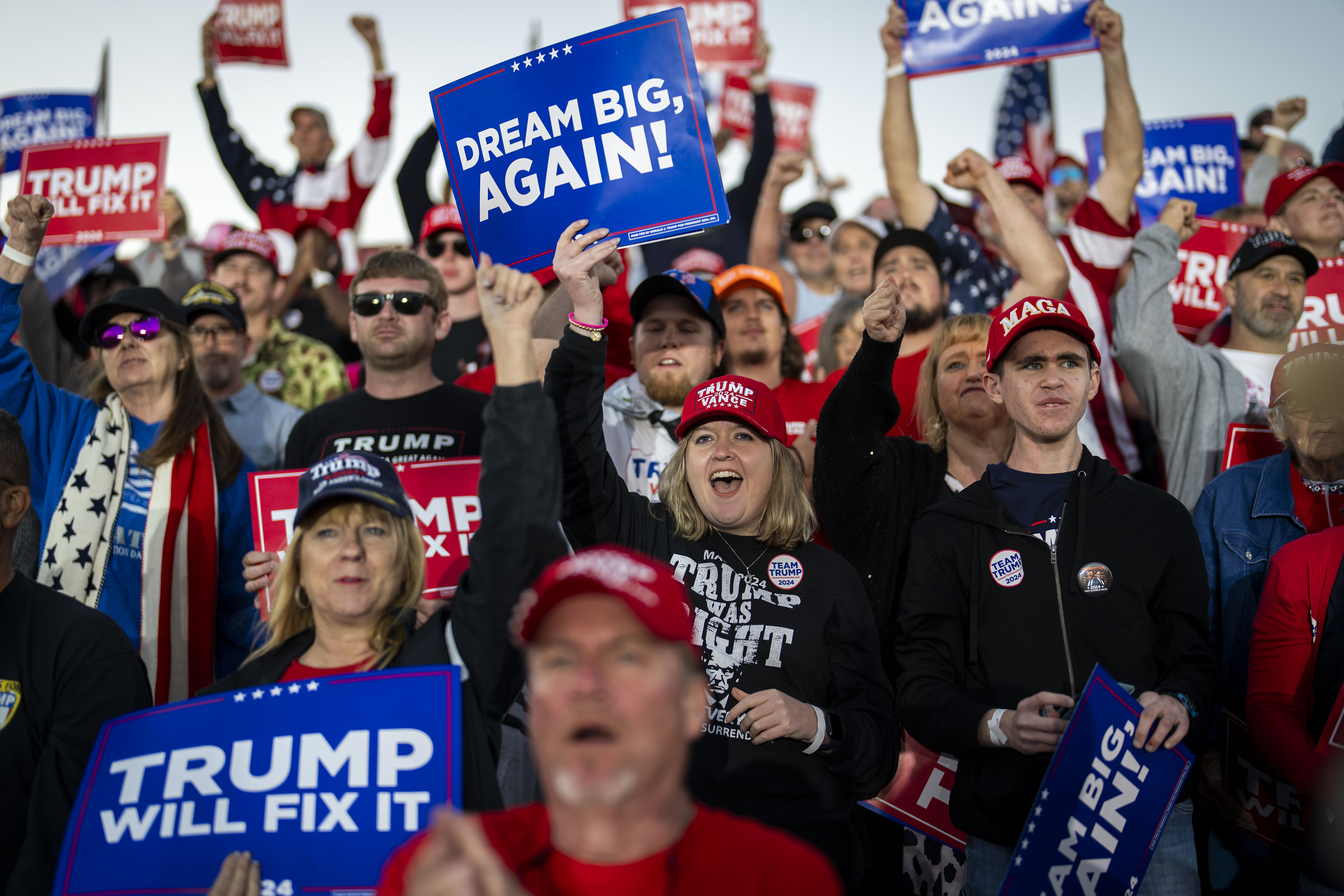 Trump supporters cheer at a campaign rally in Kinston, North Carolina on November 3, 2024. The president's current approval rating is highest among rural adults, white men without college degrees, white Catholics and white evangelical Protestants. Photo / Doug Mills, The New York Times