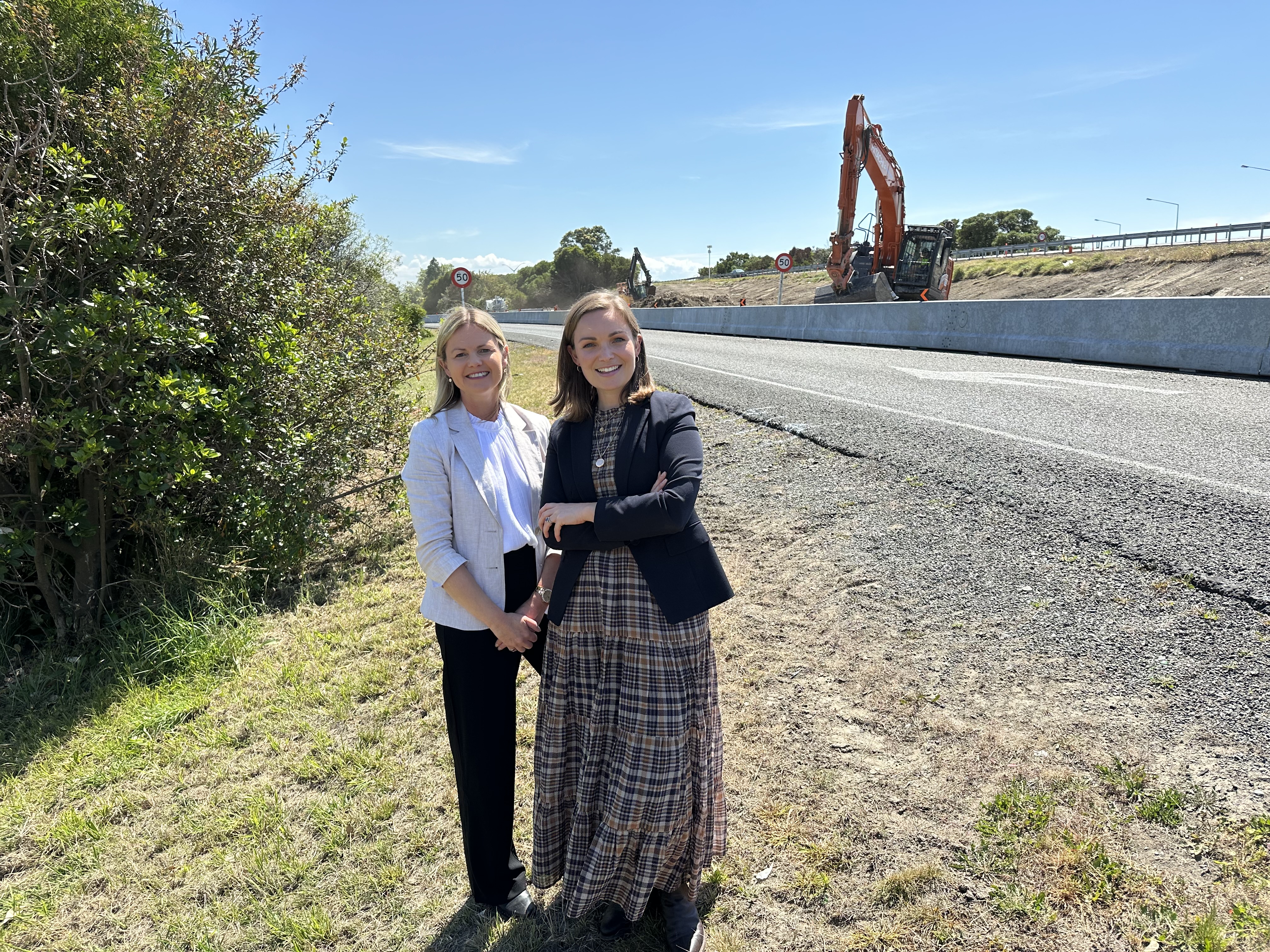 Tukituki MP Catherine Wedd (left) and Napier MP Katie Nimon at the Kennedy Rd turnoff in Napier, where groundworks have begun on the expressway upgrade.