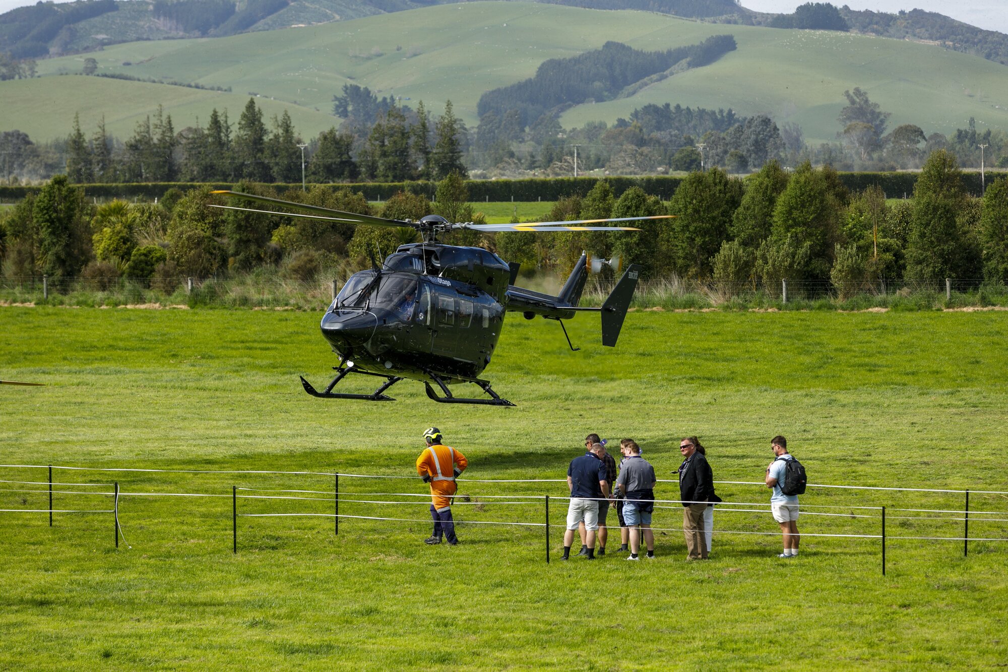 Guests line up for scenic helicopter rides at giant southern business Calder Stewart at its 70th birthday party, held just outside Milton on Thursday. Photo / Calder Stewart