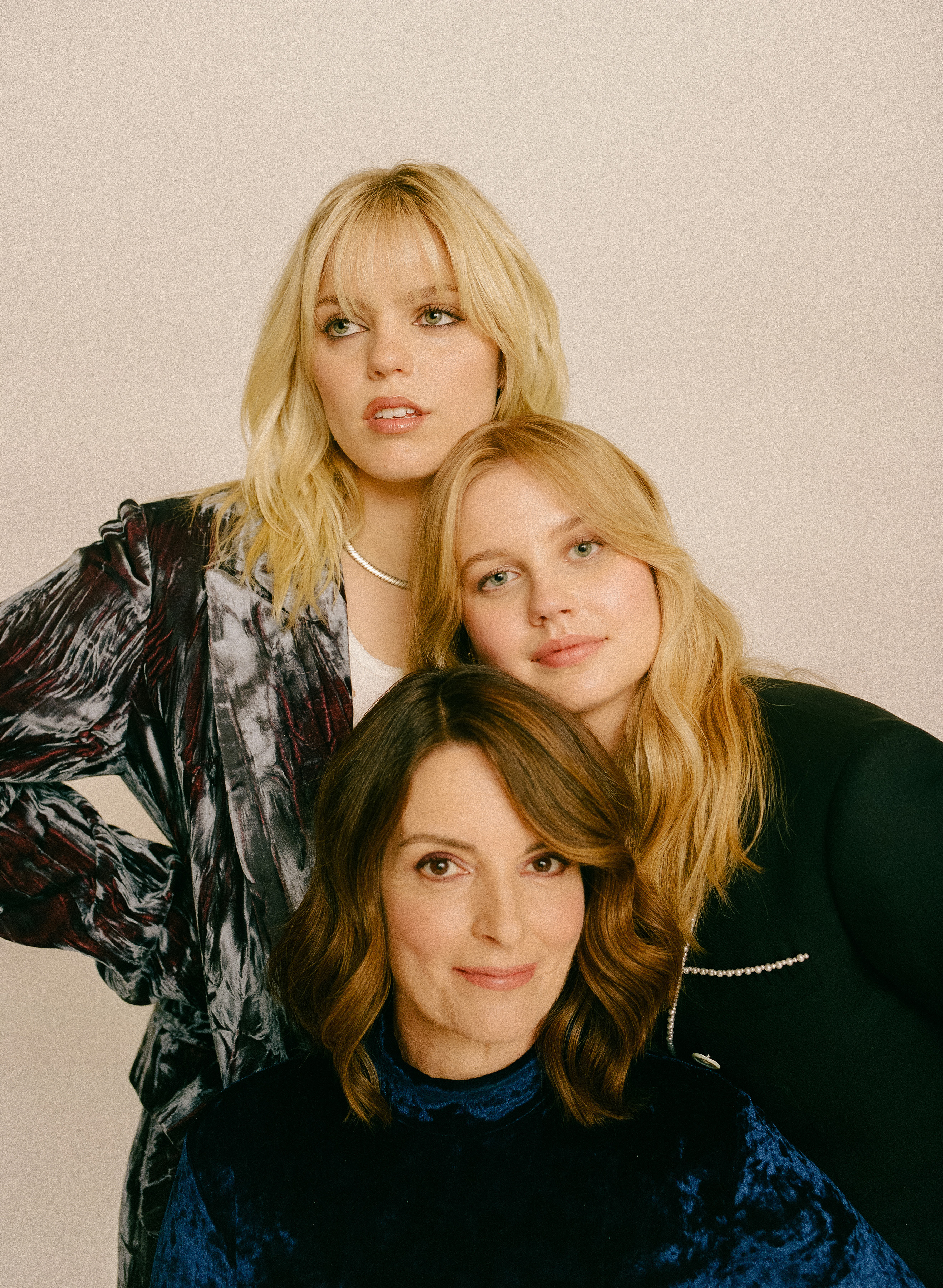 Tina Fey with the stars of the new Mean Girls film musical, Reneé Rapp, top, and Angourie Rice. Photo / Amy Harrity, The New York Times
