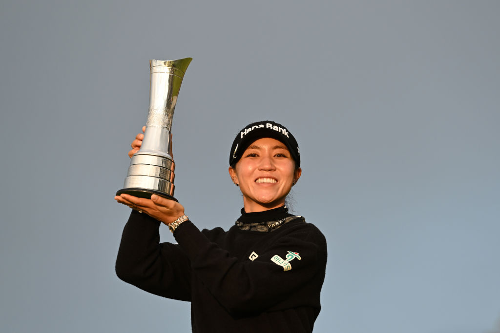 Lydia Ko lifts the AIG Women's Open trophy at St Andrews Old Course in Scotland. Photo / Getty Images