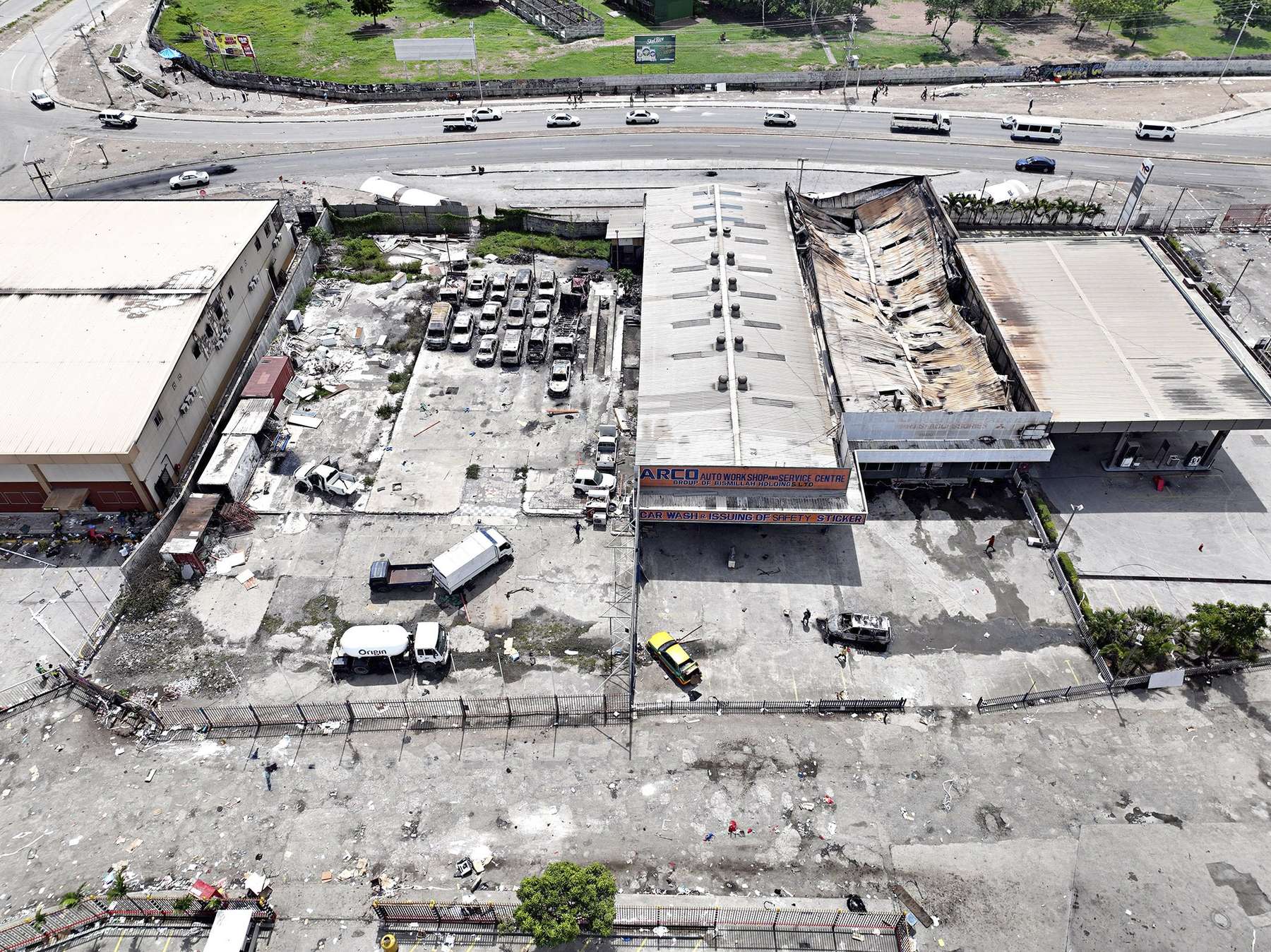 A shopping centre in Port Moresby is in ruins. Photo / Jonathan Warrey/Post Courier via AP