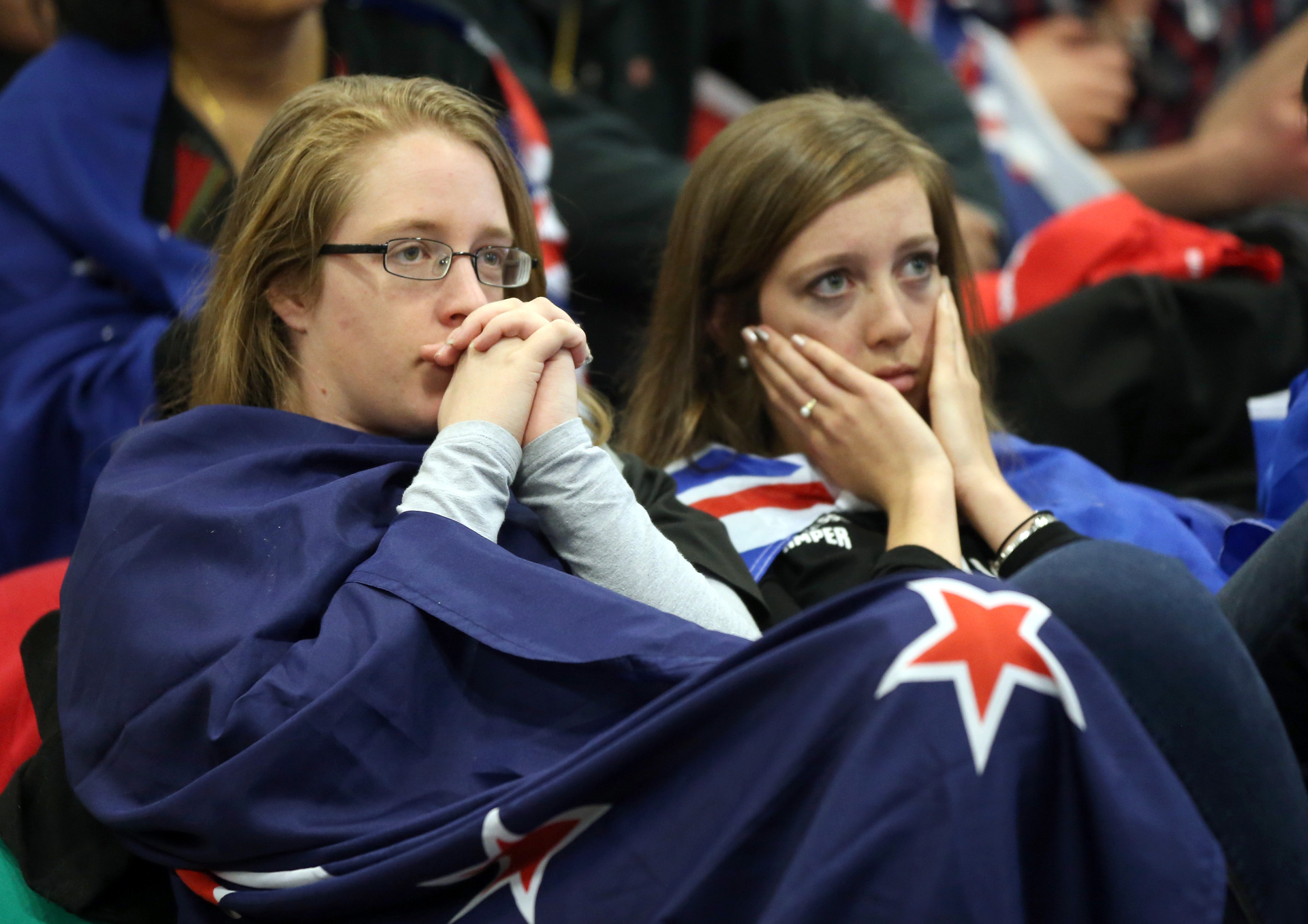 Fans at Shed 10 react as Emirates Team New Zealand loses the race during the 2013 America's Cup on September 24, 2013 in Auckland, New Zealand. Photo / Getty Images.