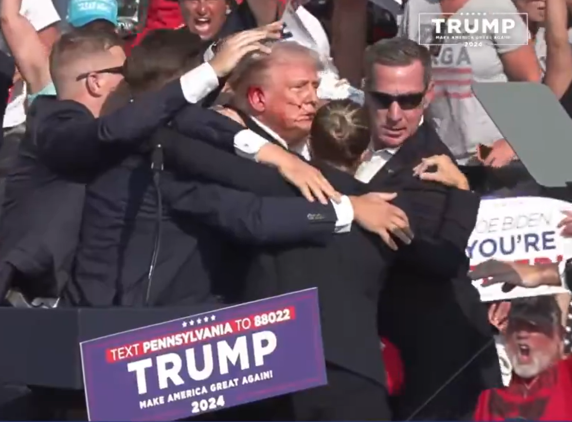 Republican presidential candidate Donald Trump is rushed from stage in Pennsylvania after appearing to be injured.