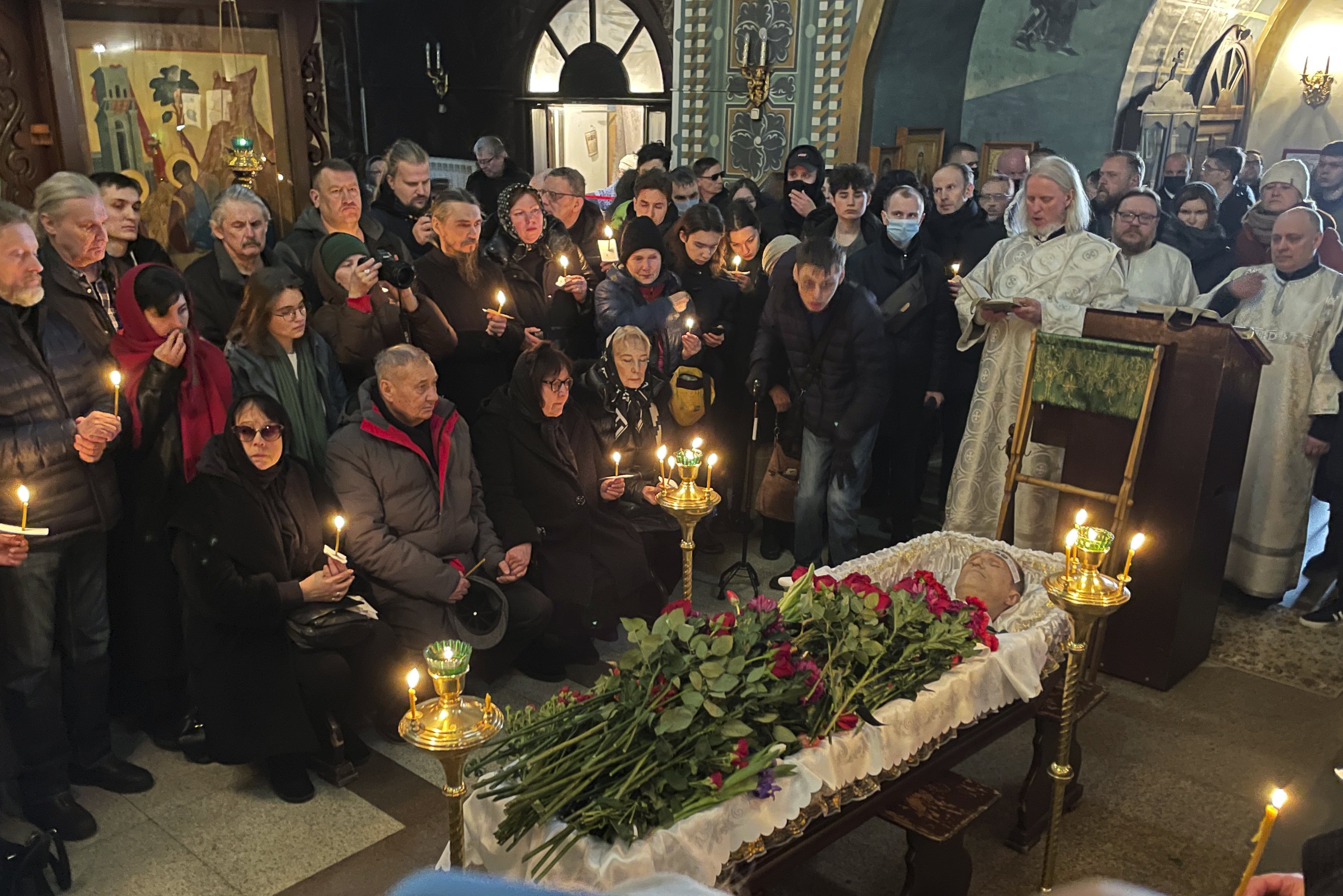 Relatives and friends pay their last respects at the coffin of Alexei Navalny in the Church of the Icon of the Mother of God Soothe My Sorrows. Photo / AP