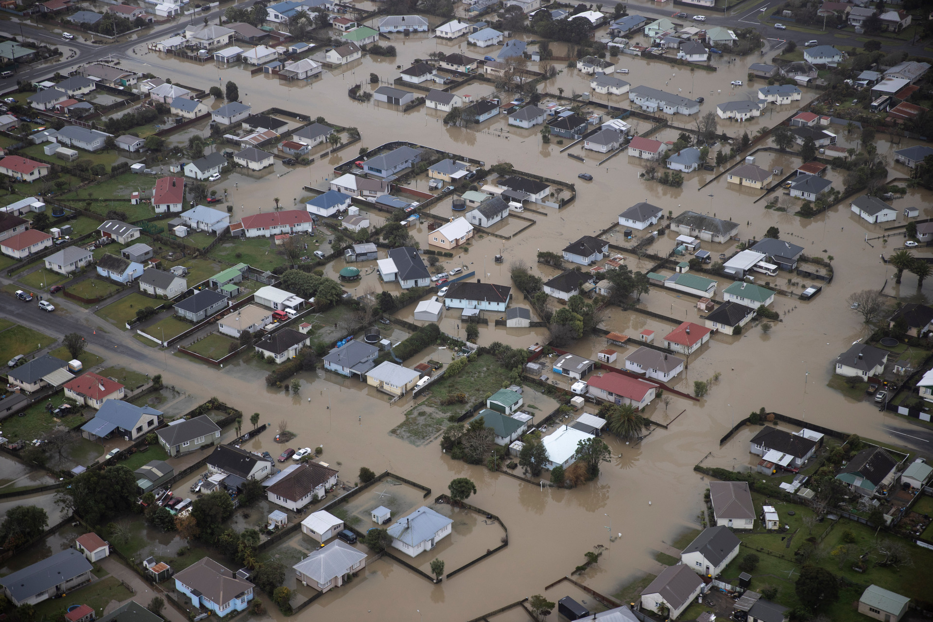 Scientists have teased out the hidden hand of climate change in one of our worst flood events - finding it made last year's West Coast deluge about 10 per cent more intense. Photo / George Heard