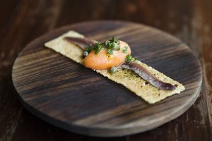 Frank Camorra's tomato-anchovy crostini - a staple on the MoVida menu. Photo / Supplied.