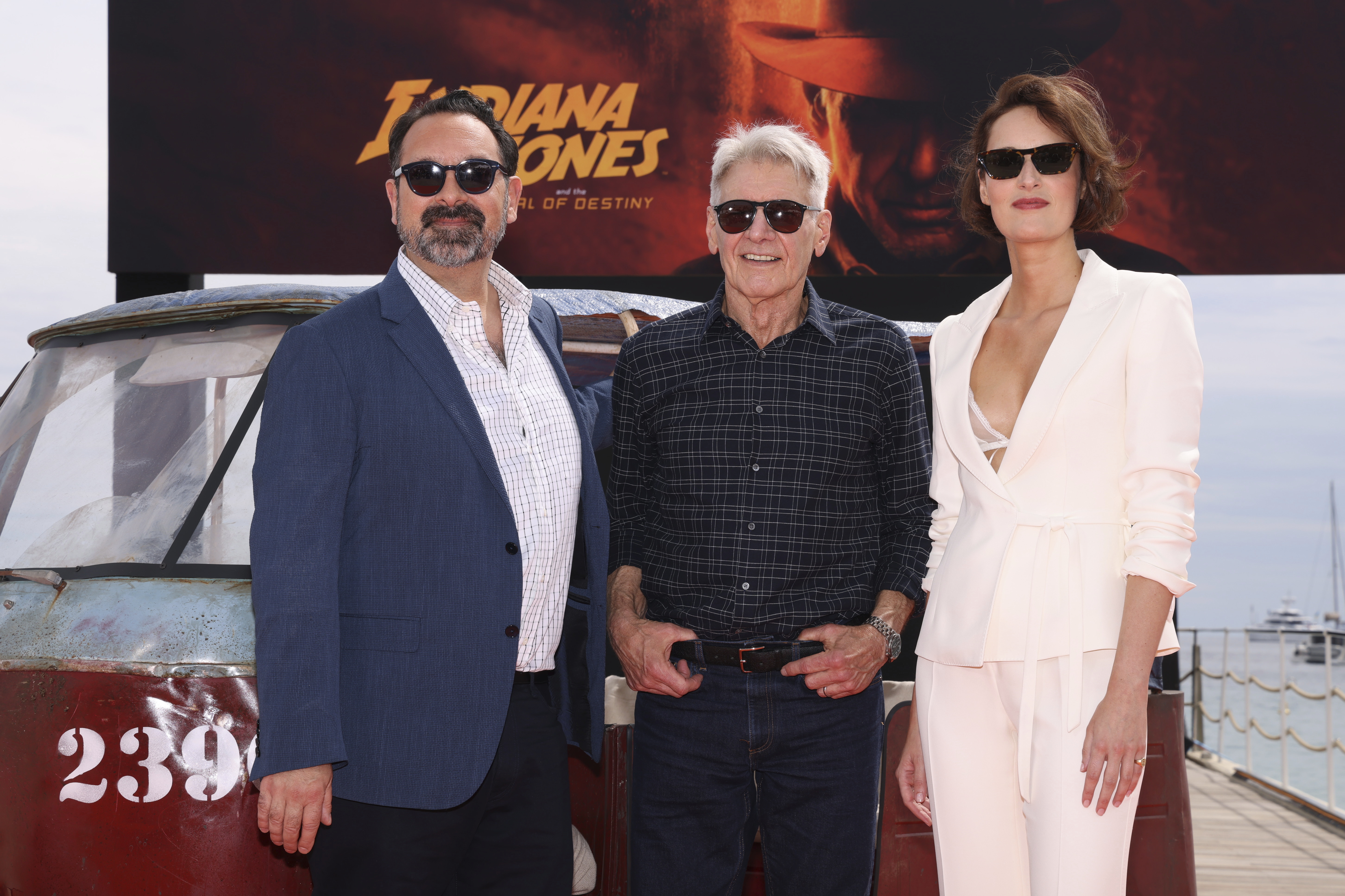 Director James Mangold, from left, Harrison Ford, and Phoebe Waller-Bridge pose for photographers at the photo call for the film 'Indiana Jones and the Dial of Destiny'. Photo / AP