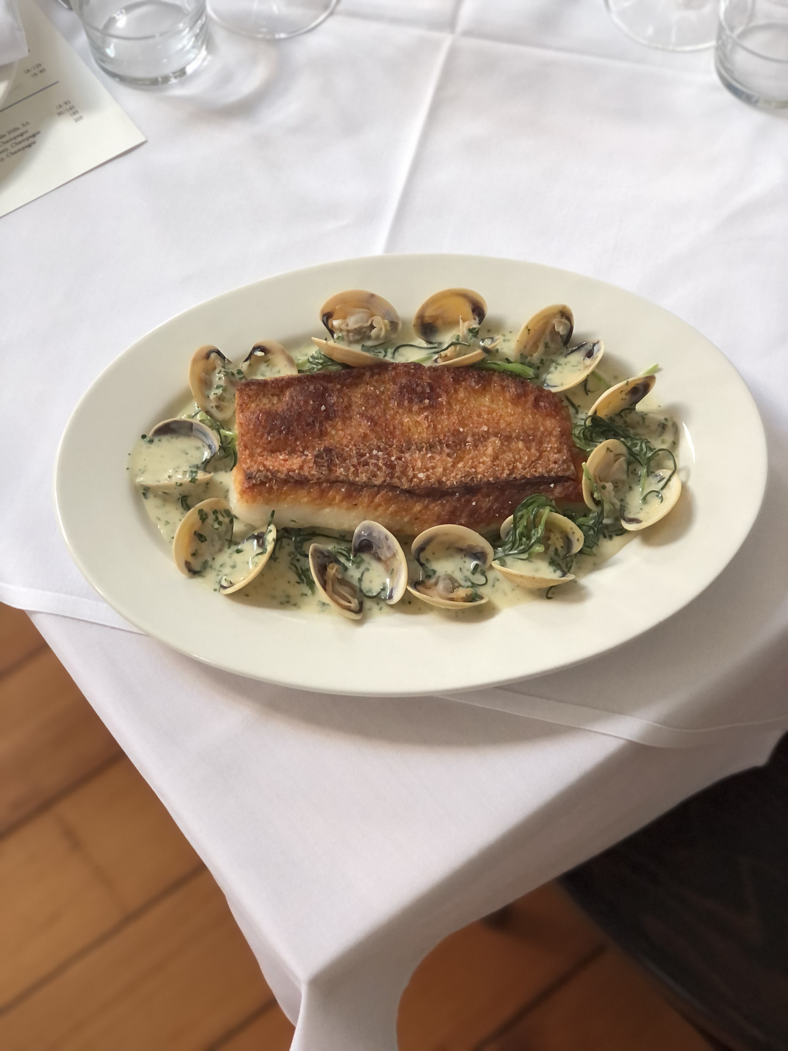 Grilled Nannygai, Vongole, Pancetta, Agretti & Pil Pil Sauce. Photo / Supplied