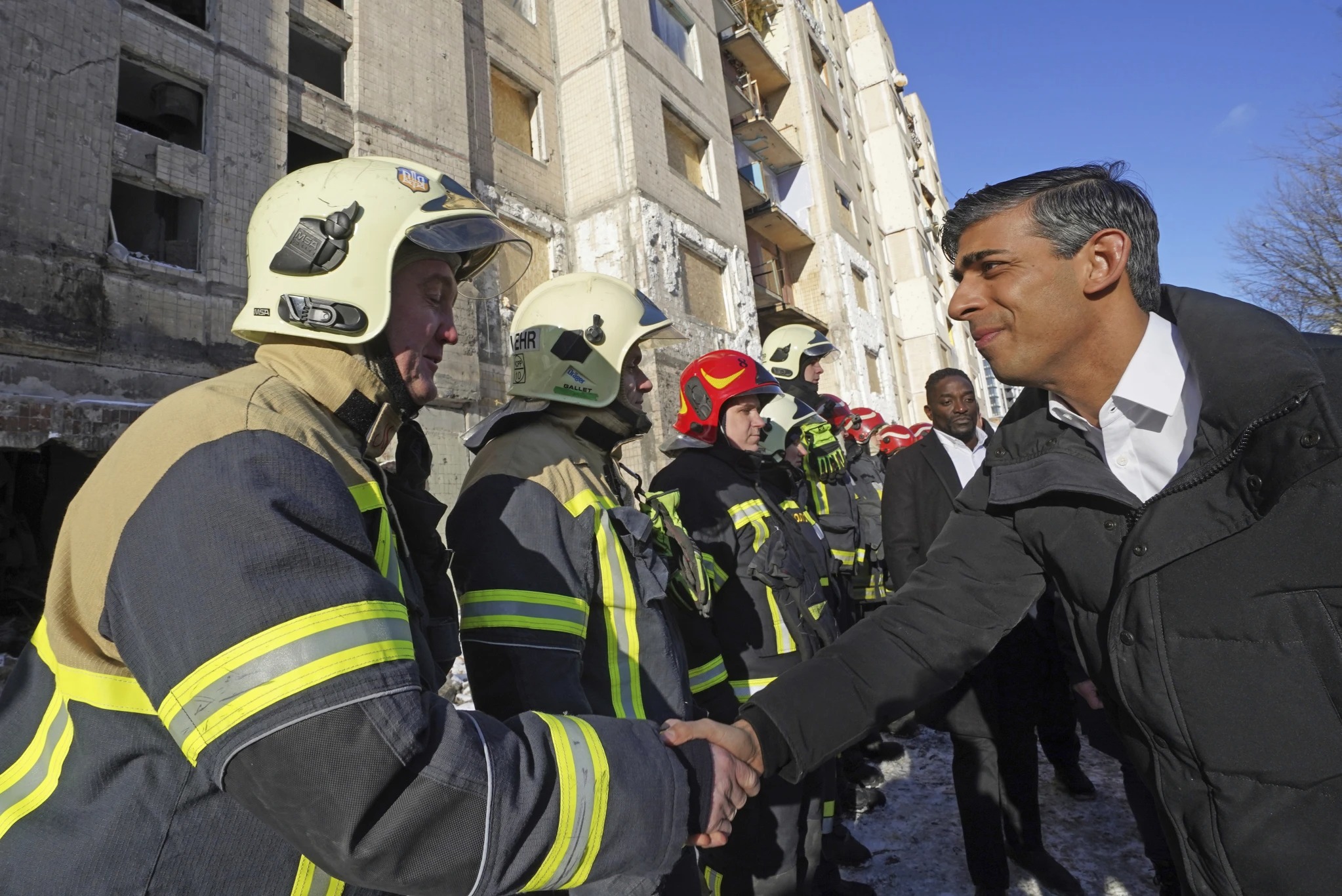 Prime Minister Rishi Sunak talks to firefighters in Kyiv, Ukraine. Photo / AP