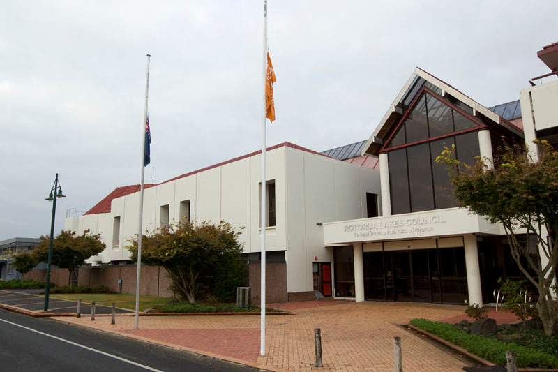 Flags at half mast outside the Rotorua Lakes Council. Photo / Ben Fraser