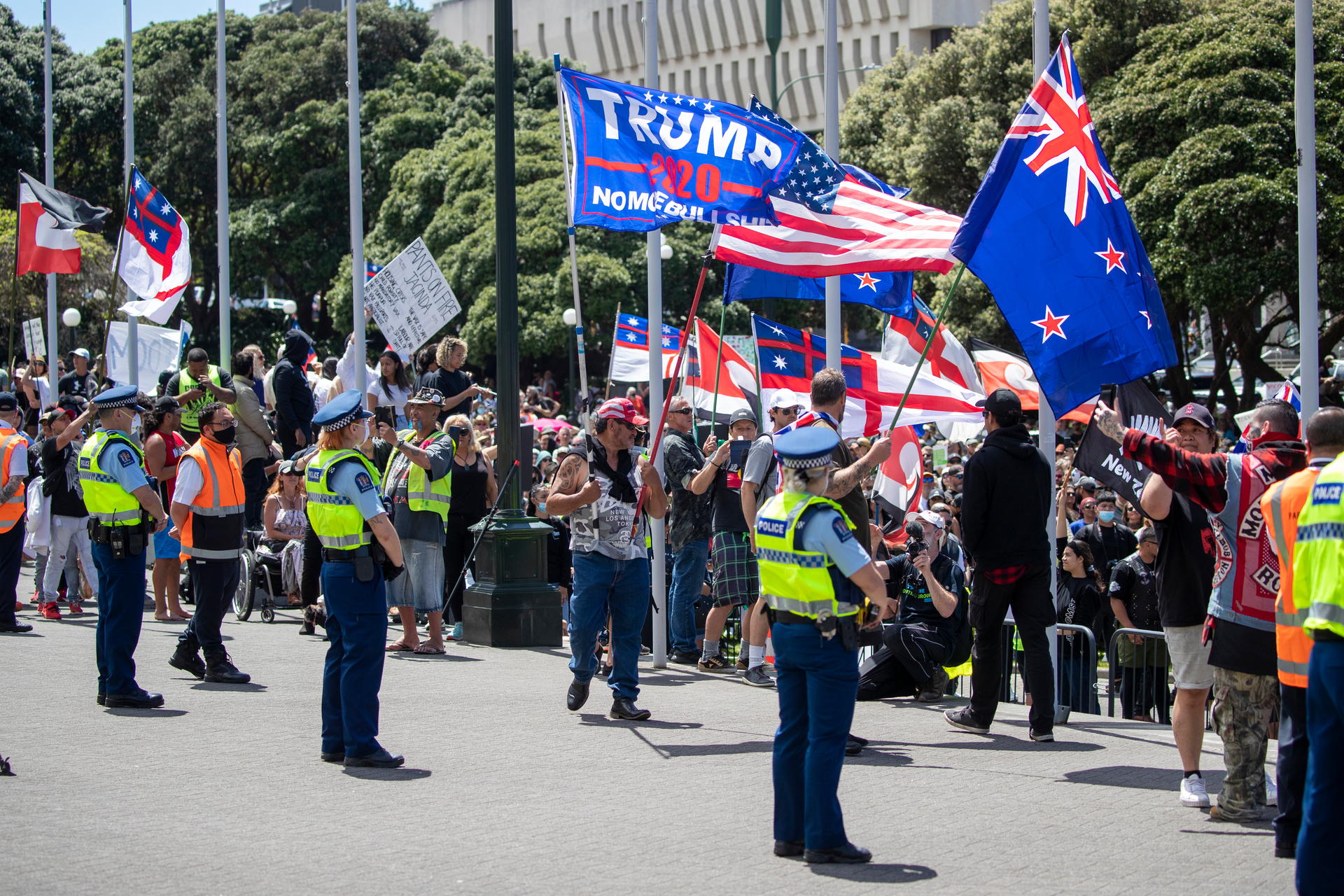 Flags for conspiracy movement QAnon and Donald Trump were seen alongside those for tino rangatiratanga at the three-week Parliament occupation. Photo / Mark Mitchell
