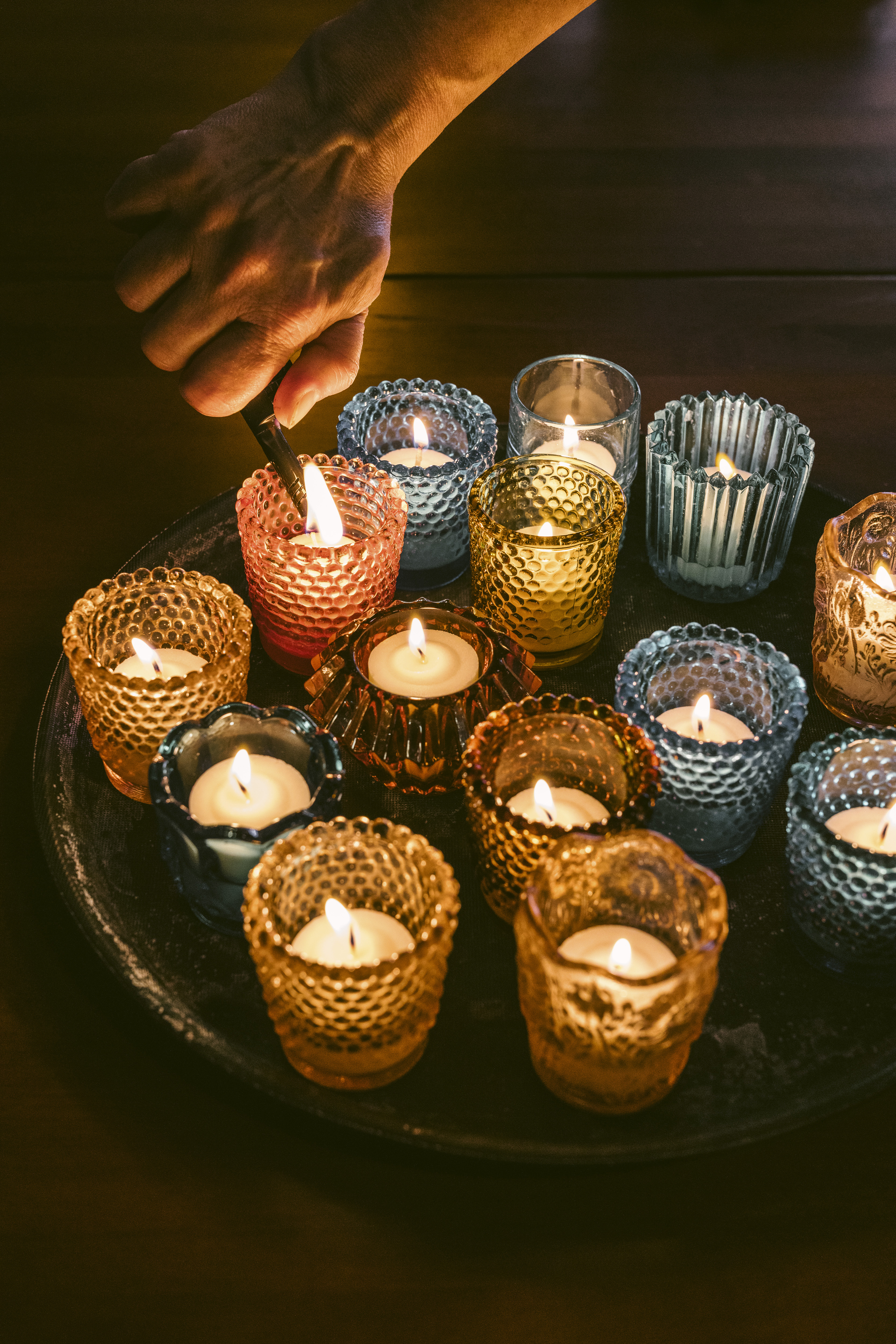 At Void, votive candles complement taper candles overflowing with wax. Photo / Lucy Hewett, The New York Times