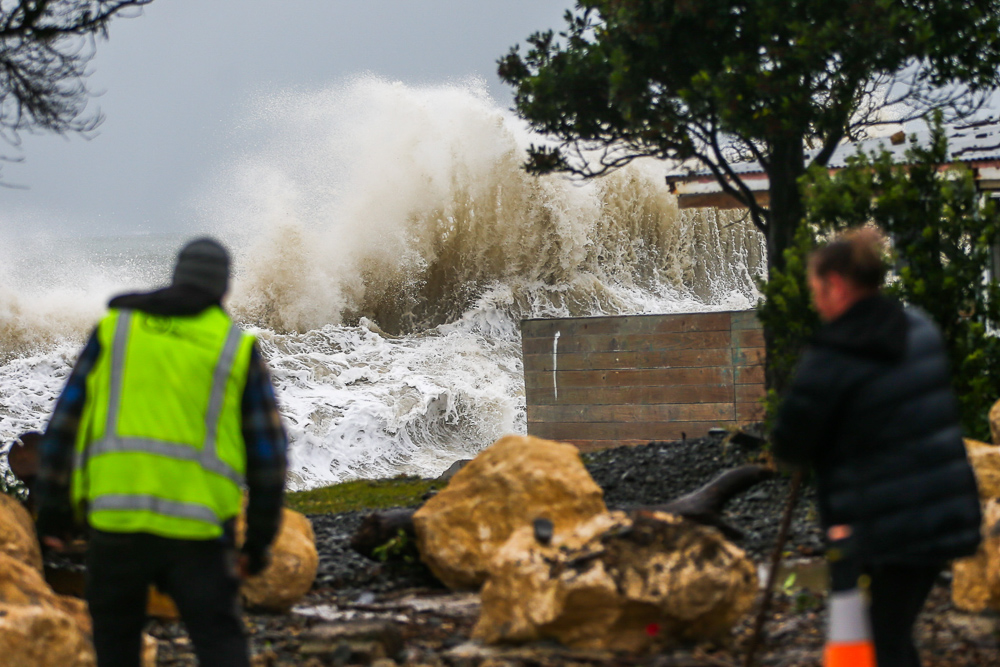 An area of Haumoana, beside the Four Square. The house in the background was already long abandoned due to the risk of inundation, with the force of the water pushing wood and nails from it onto the road. Photo / Paul Taylor