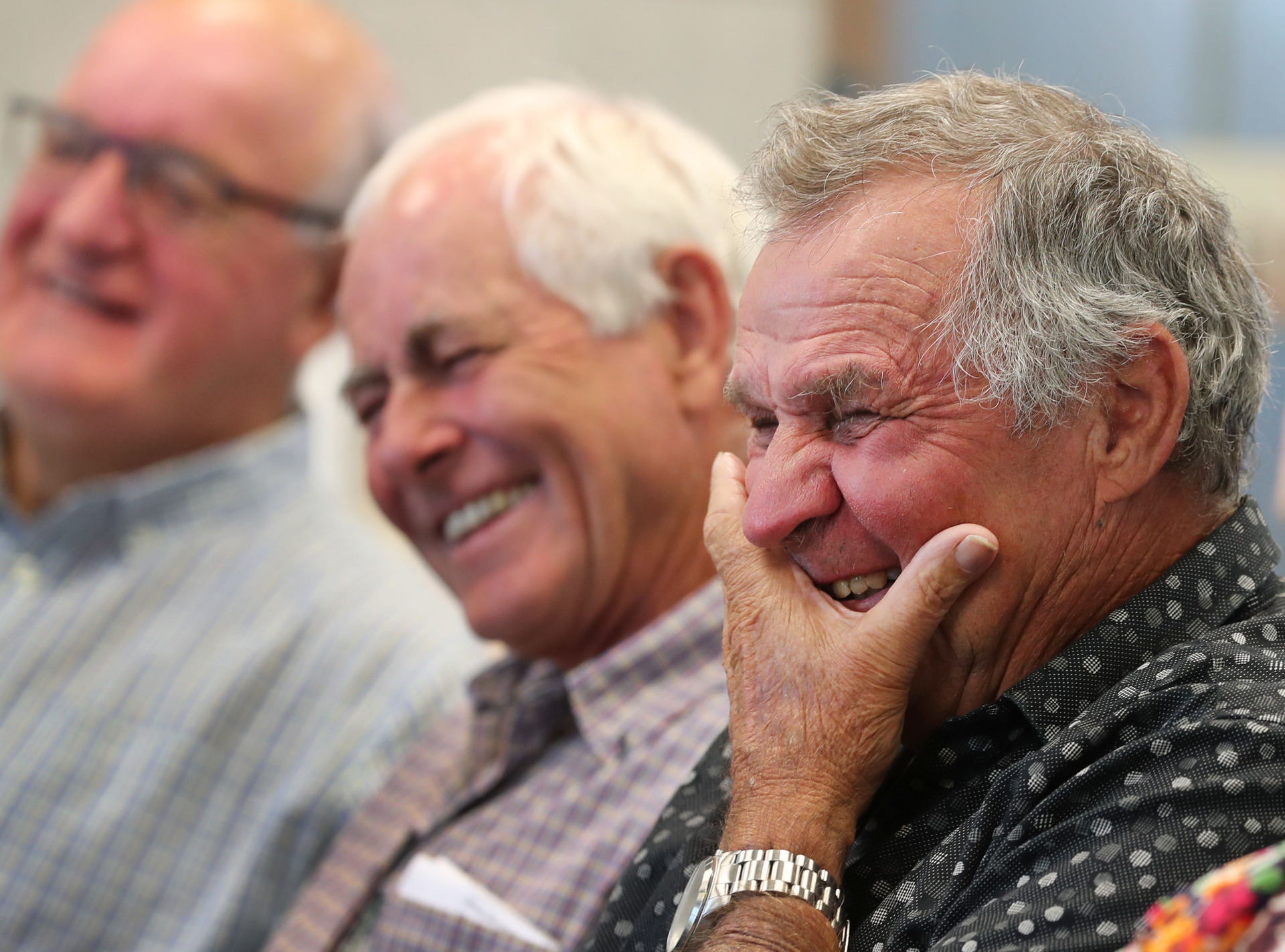 From left, Gary Williamson, James Morris and Ken Atchison share a laugh.