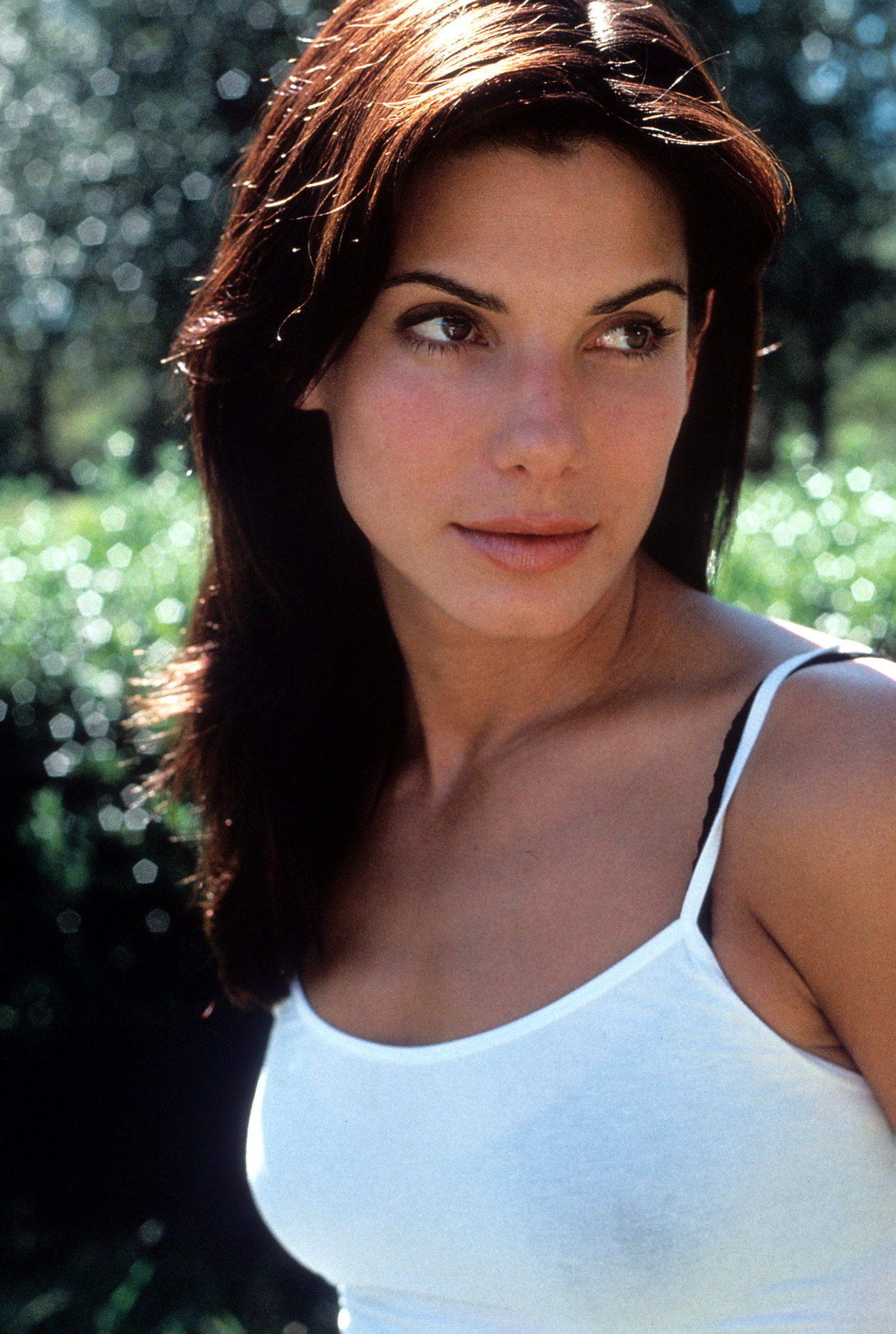 Photos from past 25 years are incredible proof Sandra Bullock doesn't age - NZ Herald