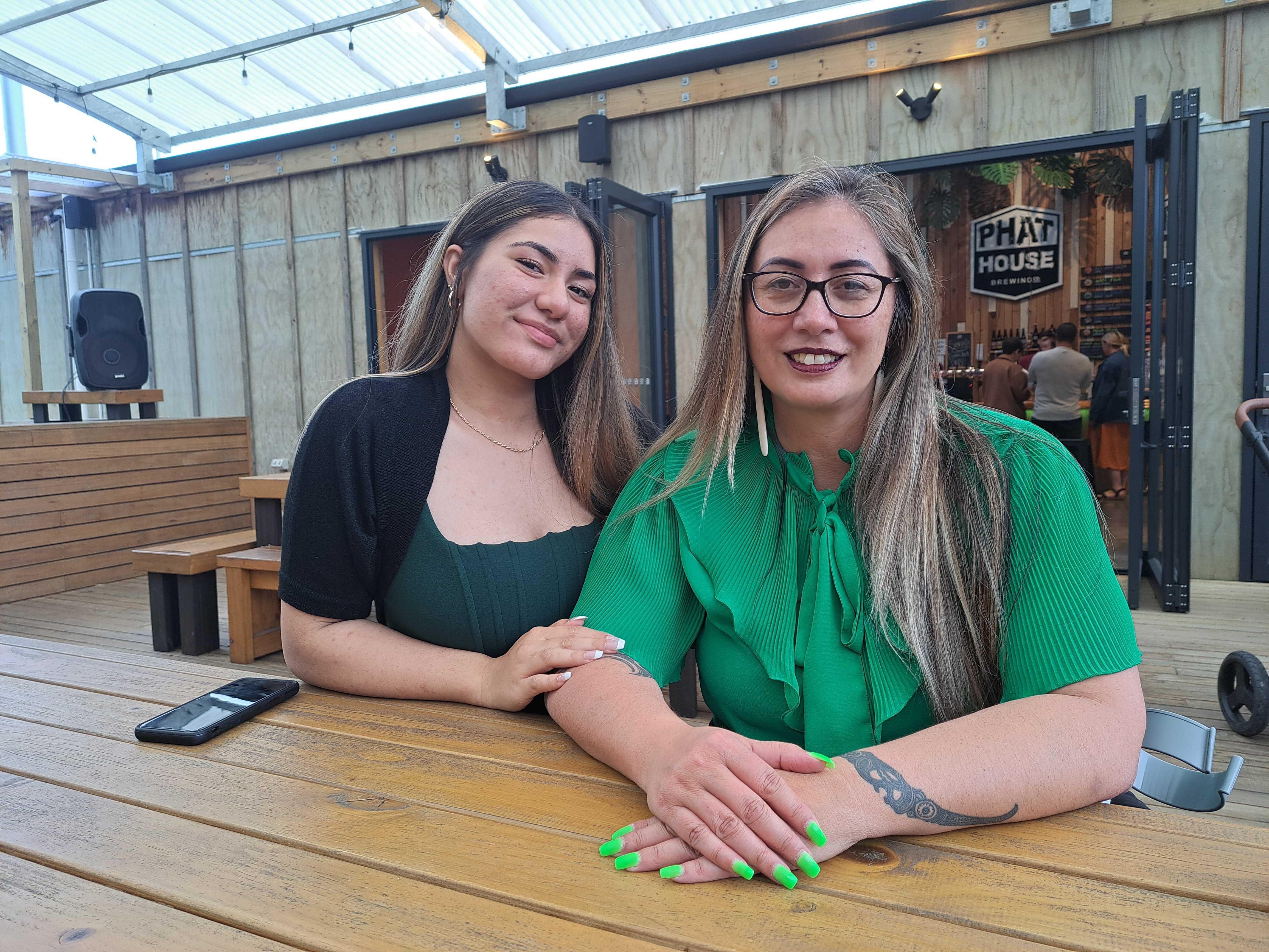 Green Party member Hūhana Lyndon with daughter Keakealani Seve at PhatHouse Brewing in Haruru. Photo / Jenny Ling