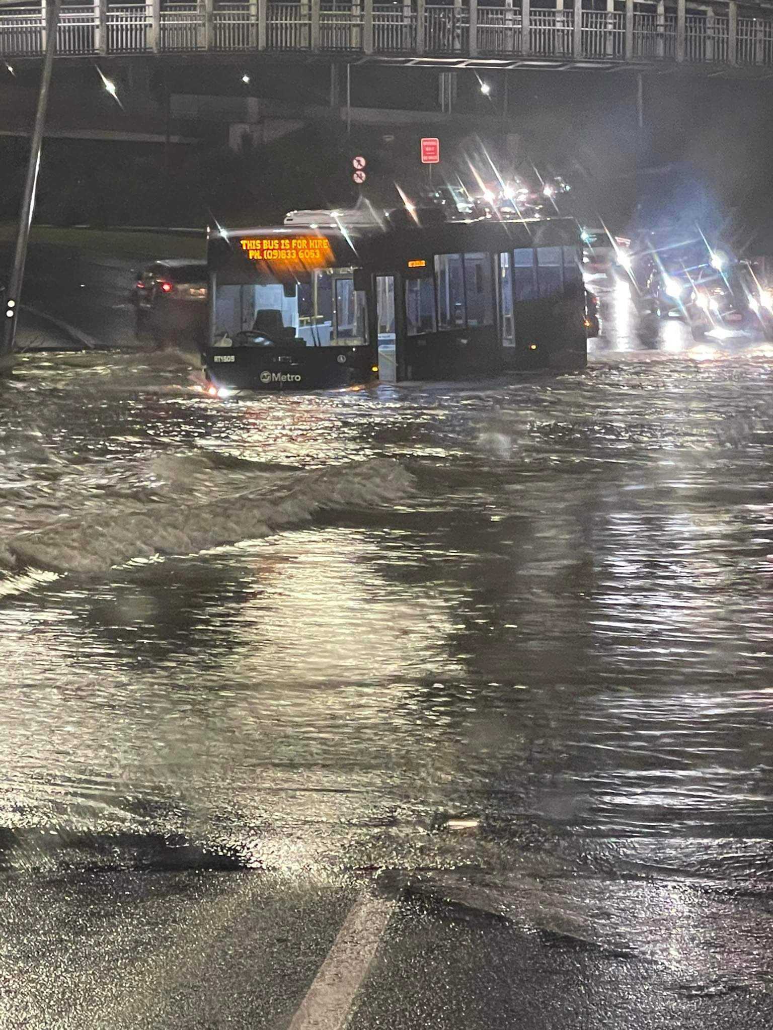 A bus stuck in flood water on Auckland's Great North Rd. Photo / Supplied