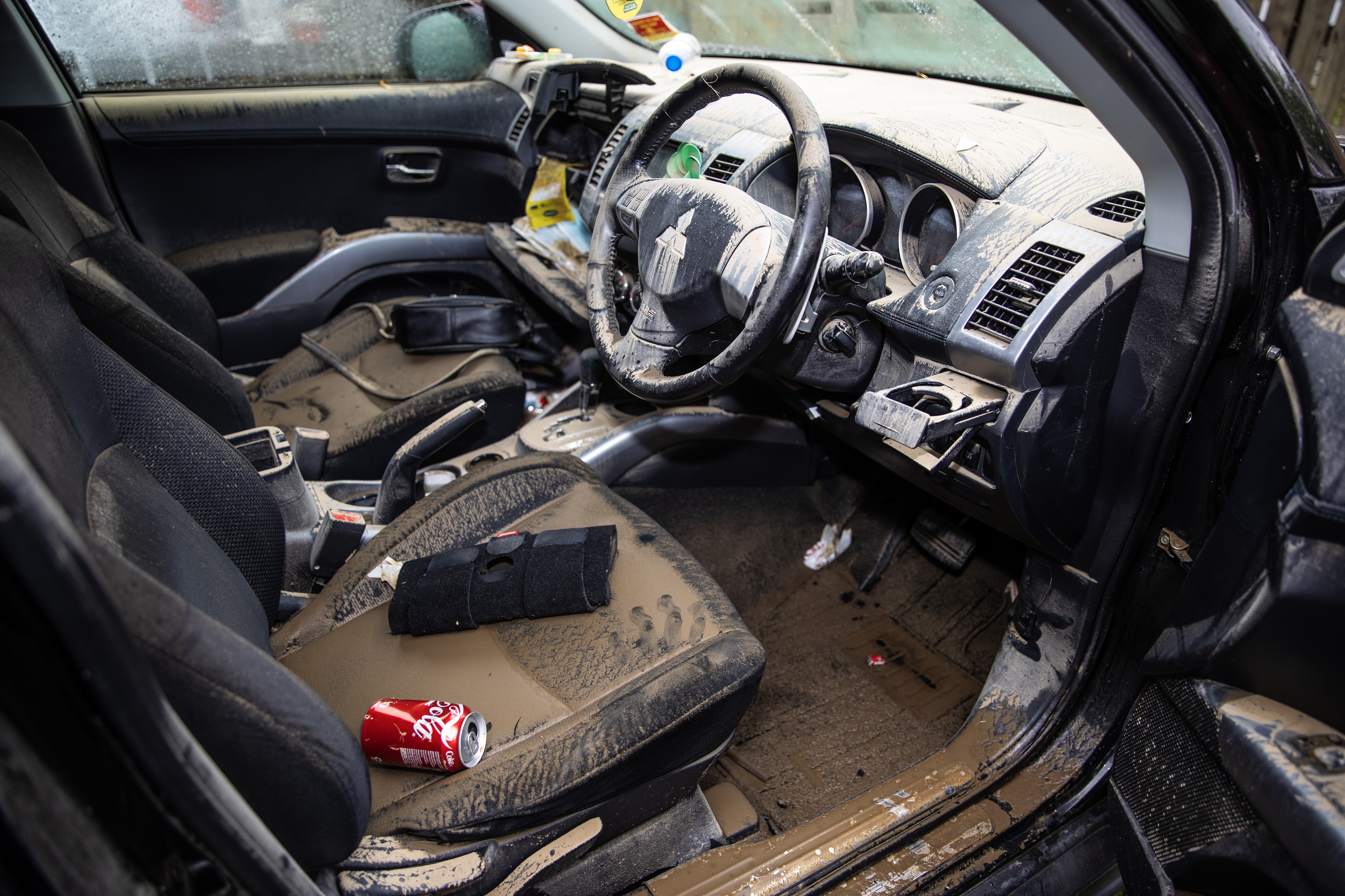 Shalina Jenning’s car is a complete write-off after the Auckland floods. Photo / Hayden Woodward