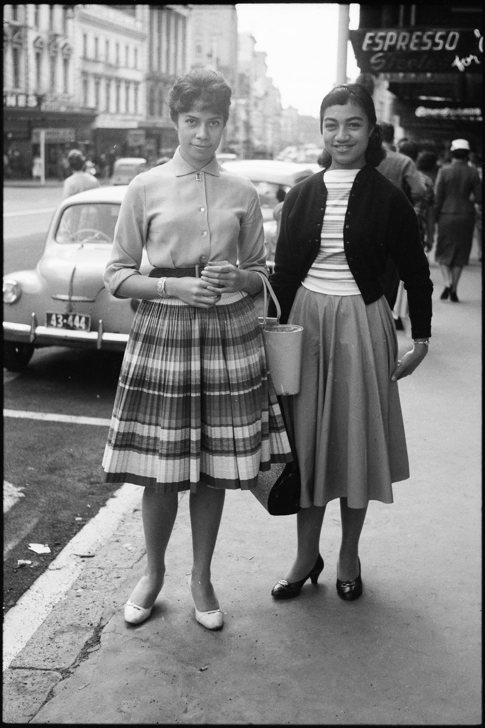 Two well-dressed women on the streets of central Auckland in the 1960s, by Rykenberg photography. Photo / Auckland Libraries Heritage Collections