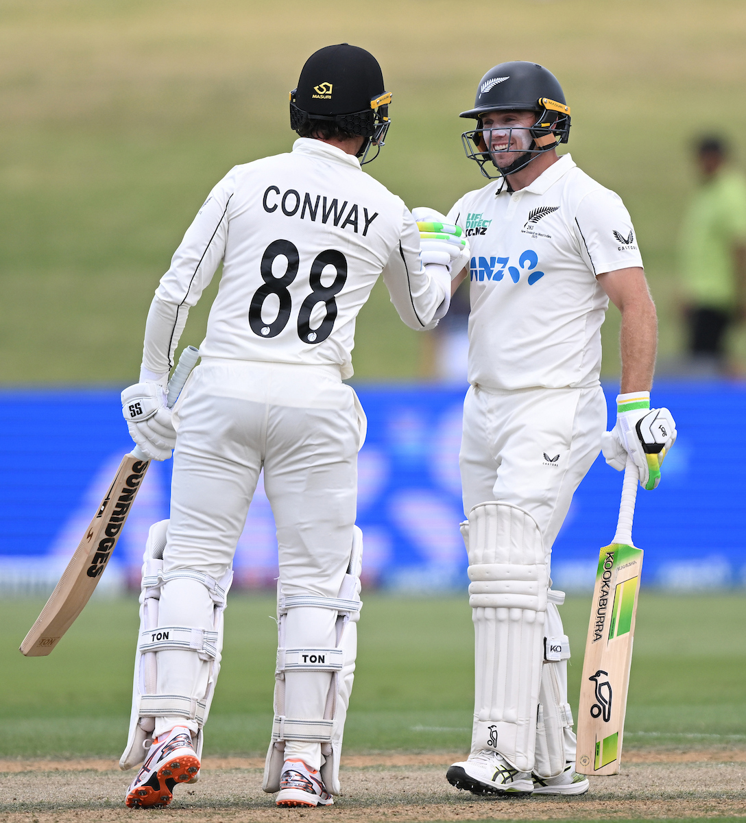 Tom Latham and Devon Conway celebrate their century stand against the West Indies at Bay Oval. Photo / Photosport