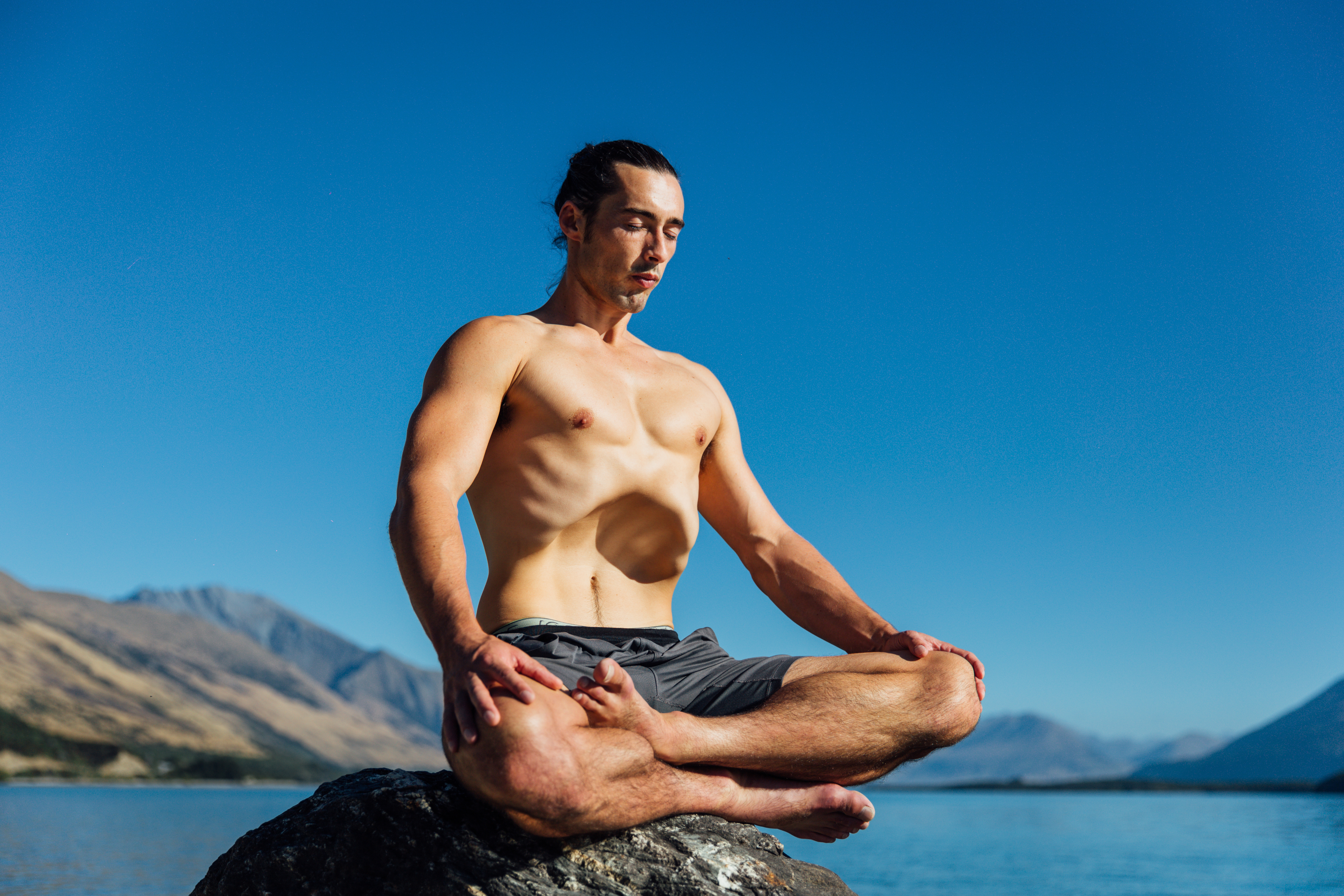 Fraser Beck of Aro Ha Wellness Retreat, Glenorchy, using an advanced yoga technique which stretches the diaphragm. Photo / Fraser Beck Collection