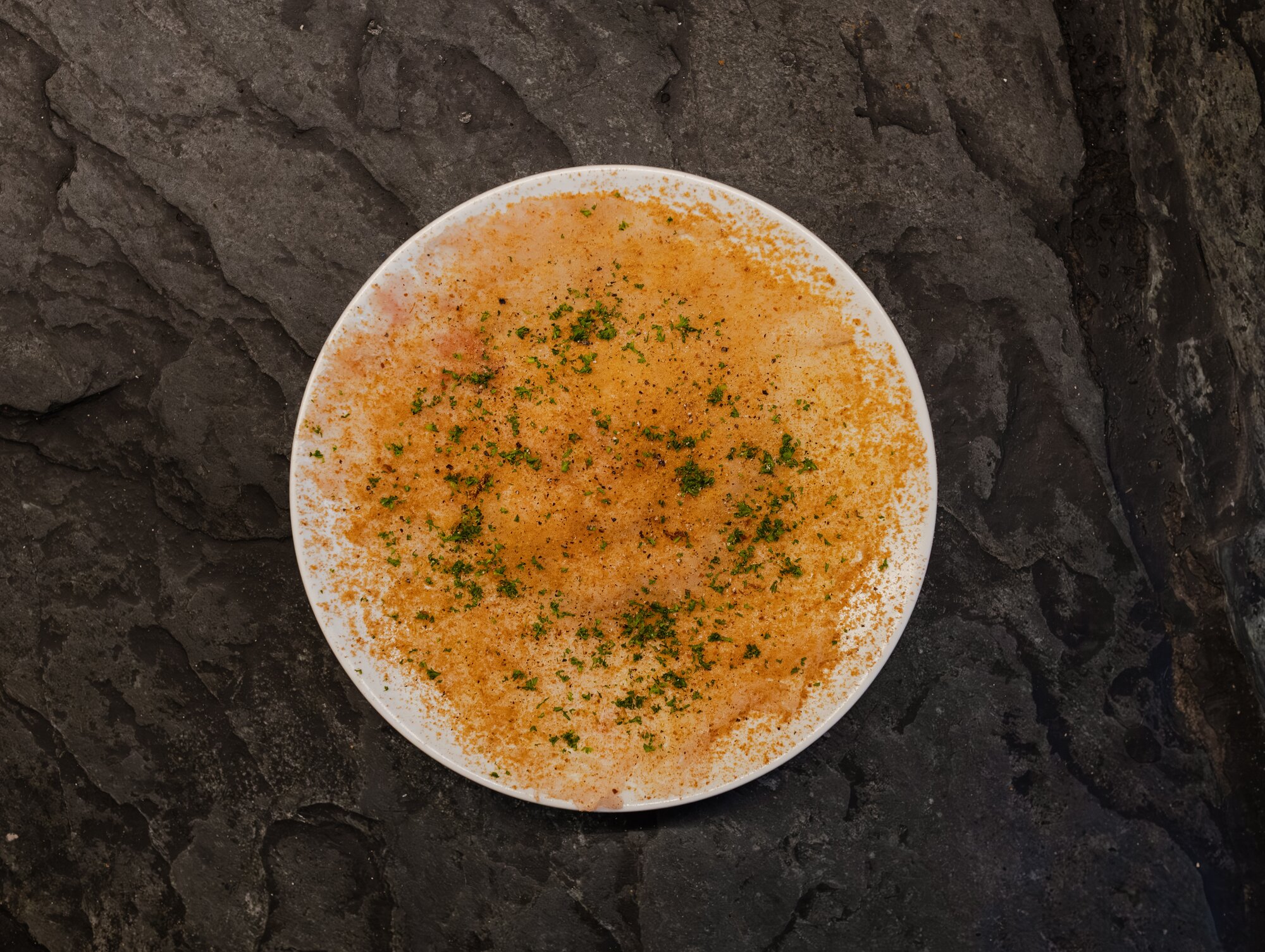 Kahawai carpaccio, bottarga and agria gnocchi at Aosta. Photo / Isabella Rubie