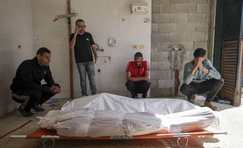 Palestinians react next to the bodies of their relatives who were killed in an Israeli airstrike in Gaza Stirp, at the Al Aqsa hospital in Deir al Balah, Gaza in May 4. Photo / AP