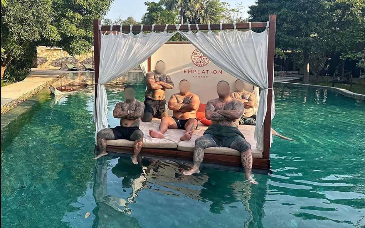 Five members of the Head Hunters gang posing poolside at their hotel in Cambodia. Photo / Instagram
